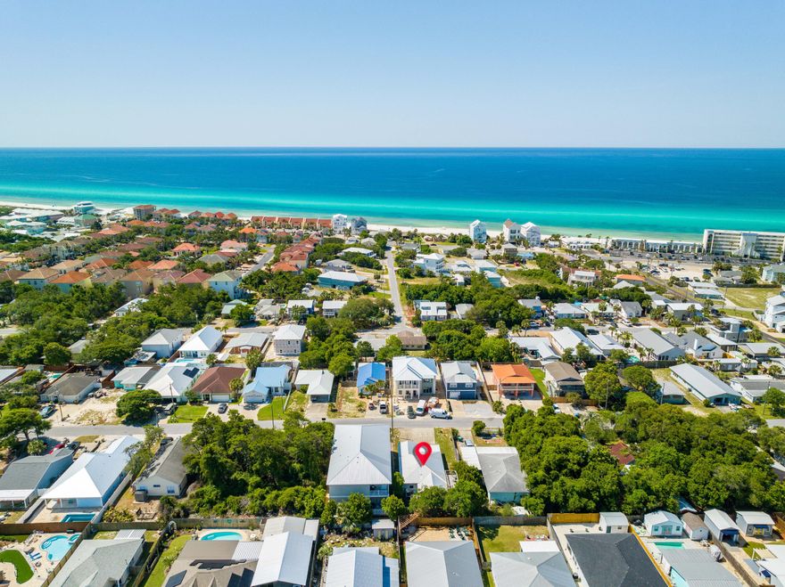 Rare 4 bedroom located in the highly desired West end of Panama City Beach. This home is located just a short walk from the beach, where you can enjoy all the sun, sand, and surf that Panama City Beach has to offer. The homes location places you nearby some of the best restaurants, shopping, and entertainment options available in the area. Complete with a garage that is ideal for storing a golf cart and beach supplies. Outside, you'll find a generous screened in porch, and an elevated deck... perfect for relaxing with friends and family. Don't miss your chance to make this stunning property your own and experience the best of Panama City Beach living! Buyer to verify all measurements.