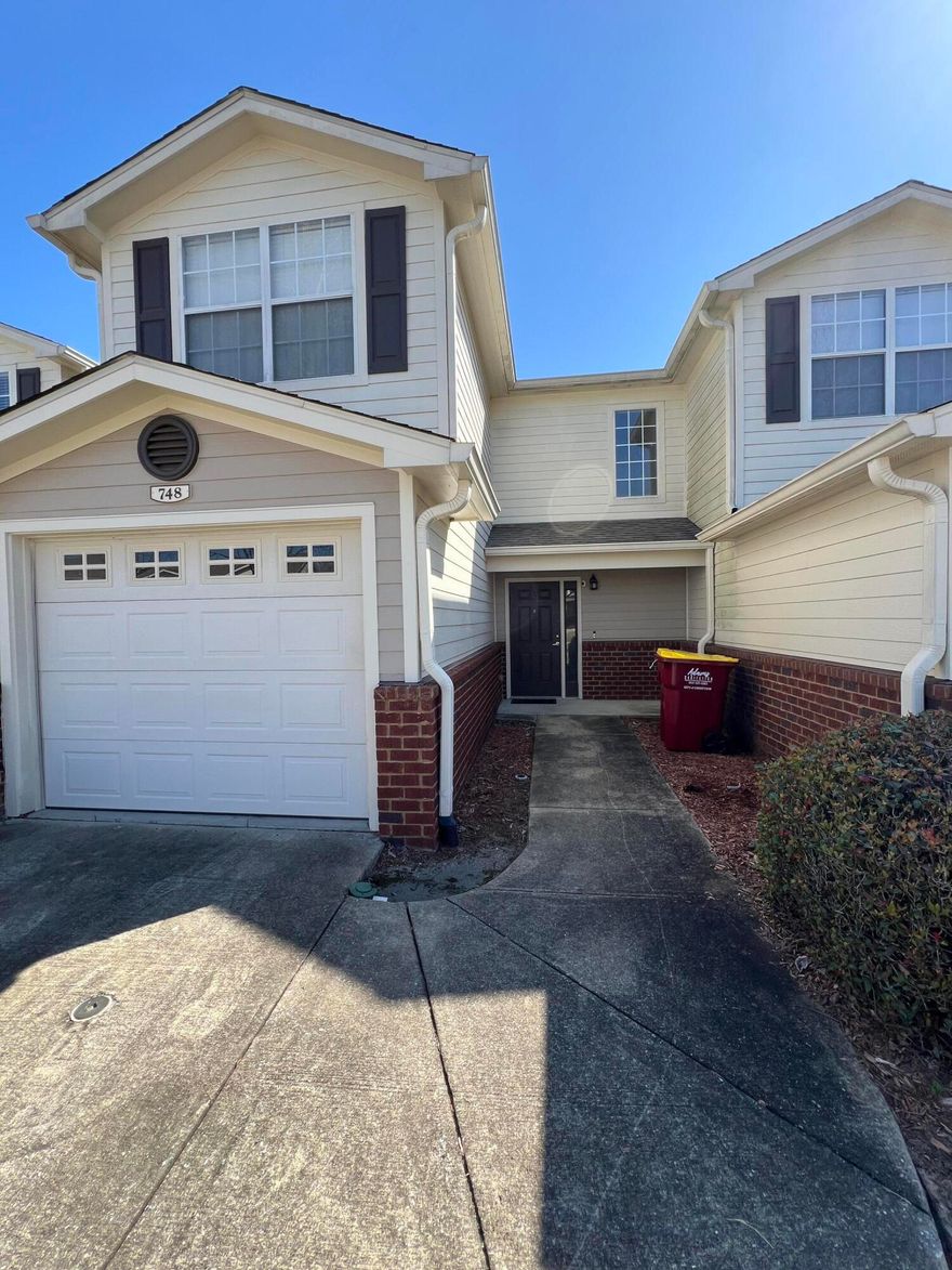 Available 07/07/25....Walk out your back door and this unit BACKS TO THE COMMUNITY POOL!  South Crestview with easy commute to bases, beaches and shopping.  Eagles Landing features this 3-bedroom, 2.5 bathroom with a single car garage, under stairs storage. All bedrooms are upstairs with a spacious master bedroom and bathroom with walk-in closet.  The two spare bedrooms have a walk-in closet as well. Downstairs you will find the living room boasts a wood looking ceramic tile, storage, 1.2 bath and laundry room.  Galley style kitchen, 1 car garage and open back patio.  This townhome community has a pool, playground, and covered front porches.  Lawn care is provided by the HOA for the complex.  Pets allowed with approval.  No smoking and no vaping.