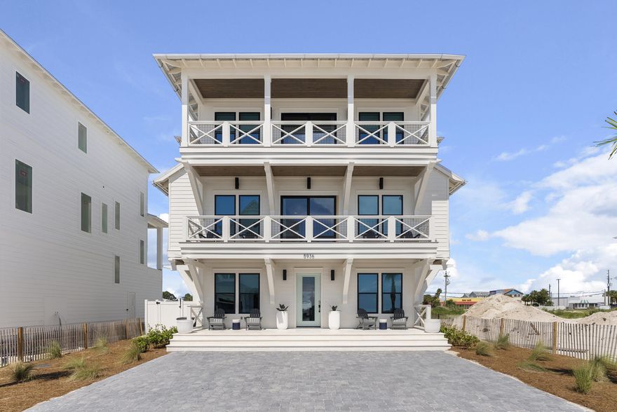 Perfectly situated along the sugar-white sands of Panama City Beach, 5936 Gulf Drive offers a rare opportunity to own within an exclusive Gulf-front enclave of just twenty-six residences. Designed and built by Thor Construction, this 4,747-square-foot coastal retreat captures the essence of refined beachside living with six bedrooms, six and a half bathrooms, and a seamless blend of private sanctuaries and gracious gathering spaces. From the moment you step inside, the home reveals a remarkable attention to detail and craftsmanship. The kitchen, a true centerpiece, showcases custom cabinetry, a striking island ideal for both entertaining and casual dining, and timeless finishes that reflect understated luxury. Expansive living areas invite both relaxation and celebration, flowing effortlessly to panoramic views of the turquoise Gulf waters.

The third-floor primary suite crowns the home with sweeping outlooks, creating a serene haven above the shoreline. For extended family and guests, the spacious bunk room with two custom-built king bunks elevates comfort and style while maximizing hosting potential. Throughout, every detail is curated to balance livability with elegance.

Outdoors, a fenced backyard provides a private retreat for enjoying Gulf breezes, while just beyond, the enclave's sixteen Gulf-front and ten first-tier homesites embody the prestige and rarity of this community.

More than just a home, 5936 Gulf Drive is an architectural statement of coastal sophisticationcrafted for those who seek timeless design, effortless comfort, and an unrivaled sense of place.