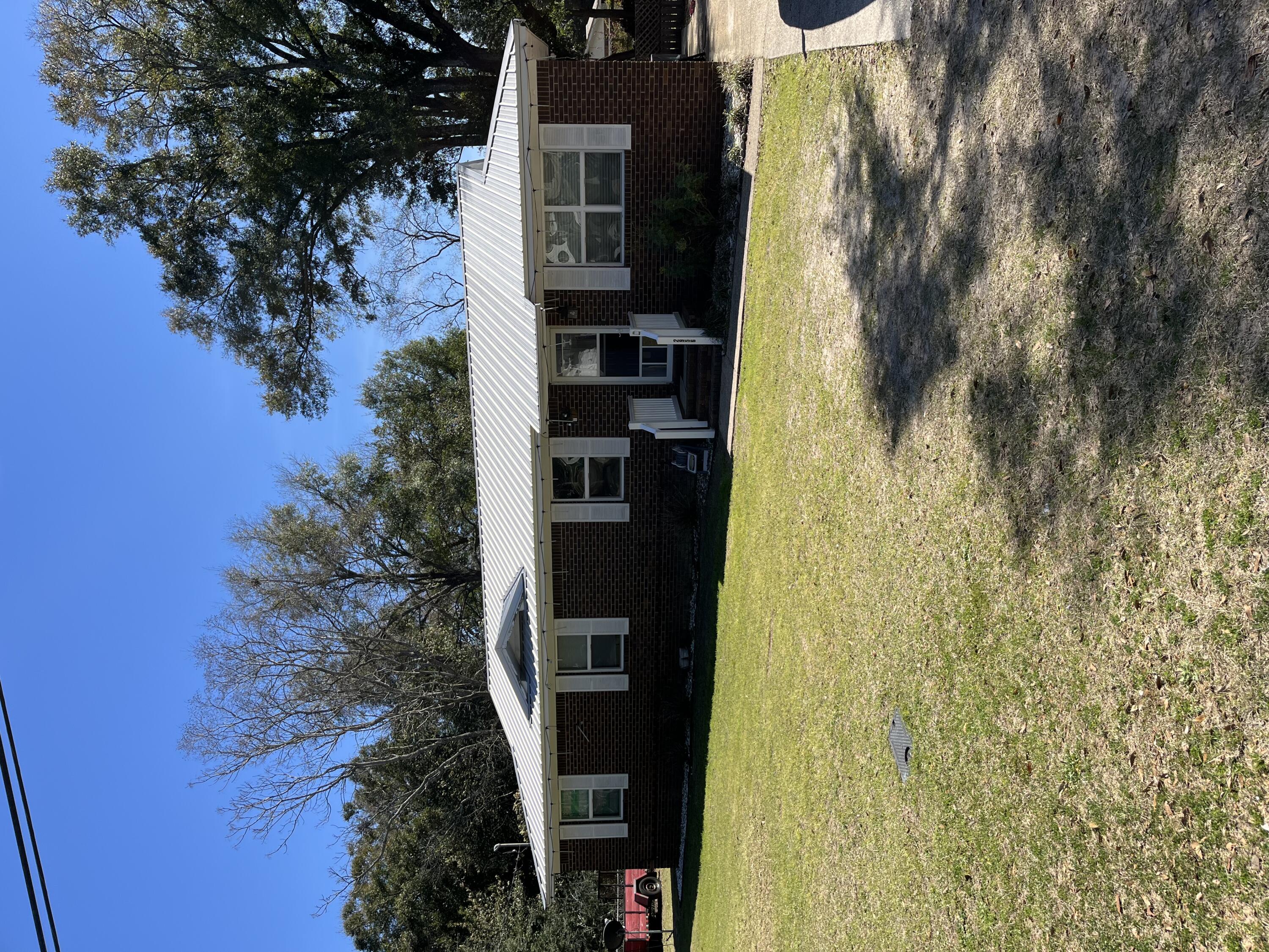 Motivated Seller - Don't Miss This Opportunity!This charming all-brick ranch home is a hidden gem with incredible potential, nestled on a generous .34-acre lot in a prime location. Featuring 4 bedrooms and 1.5 bathrooms, this home offers a solid foundation and timeless appeal.Enjoy outdoor living in the large screened-in porch, perfect for relaxing or entertaining. With plenty of room to personalize and make your own, this property is ideal for homeowners or investors alike.Bring your vision and unlock the full potential of this home!