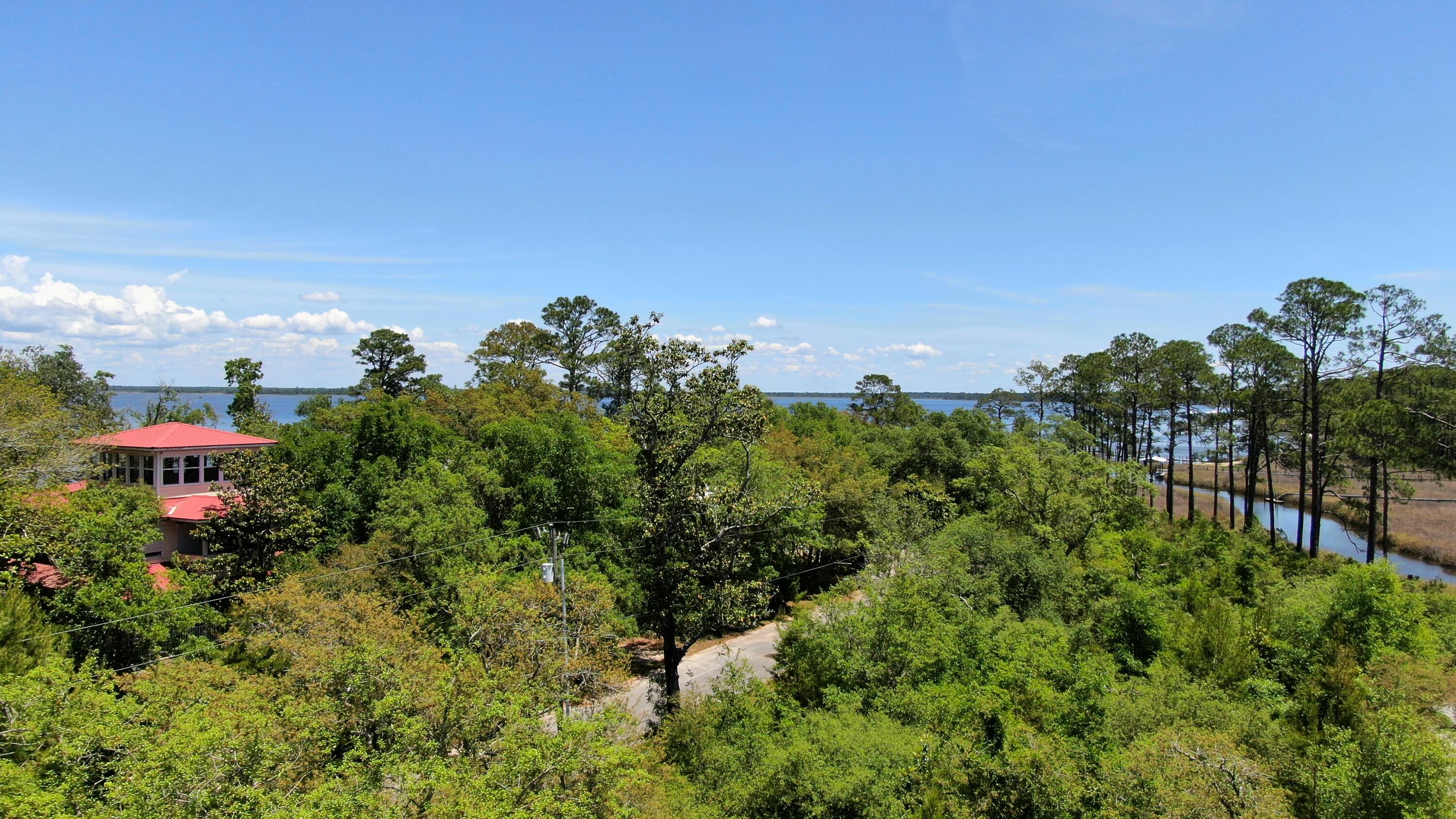 *Under contract but accepting back up offers. Located in the locally beloved, peaceful community of Point Washington, this homesite offers the opportunity to build your dream home steps from the Choctawhatchee Bay. Live the Old Florida lifestyle in a tranquil environment surrounded by lush greenery, no HOA and no wetlands all within close proximity to the water. Conveniently, this homesite conveys with engineered stamped floor plans for a 2,500 heated and cooled square foot home, elevation certificate, wetland study, and survey. With potential future Bay views, access to a boat ramp and bayfront park with a public dock, this incredible piece of land is the perfect place to build your next home.