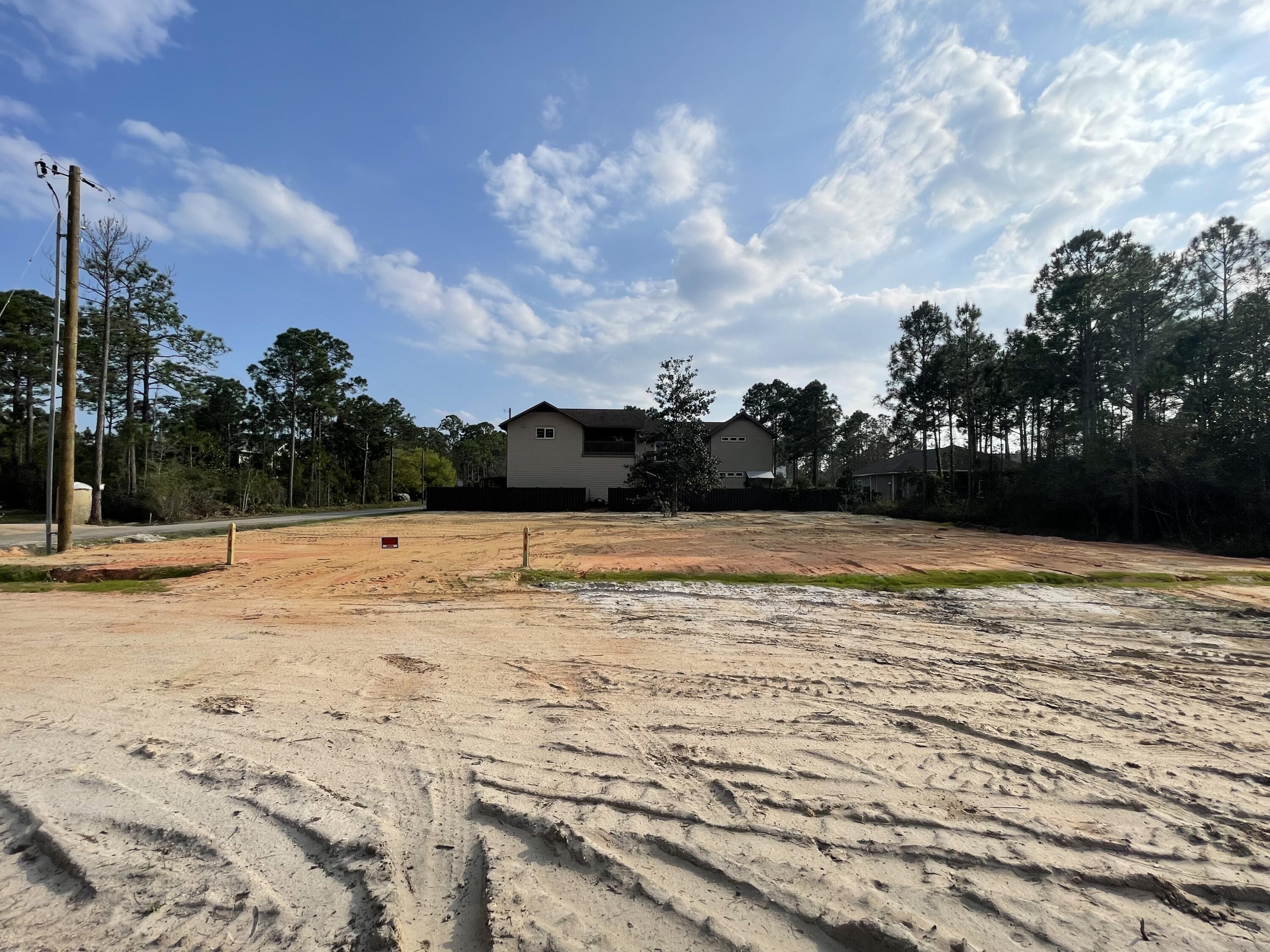 Fabulous Ready, Build corner lot w/paved frontage (approx. 1/4 acre) in excellent location. No HOA, No Restrictions and No ARB! Dream it and build it right here!! Blank canvas ready for you! All of this located in close proximity (approx. 1,000 feet) to public access to Hogtown Bayou, which leads into breathtaking Choctawhatchee Bay. The location offers a haven for your future home, while providing easy access to all the excitement that Santa Rosa Beach, Miramar, Destin & 30a have to offer such as the breathtaking white Sandy beaches of Florida's Emerald Gulf Coast from eloquent dining, fishing, boating, entertainment options, excellence in shopping conveniences, Destin's famous Crab Island and and more... Act now, this lot is waiting for you to get started with your Home vision! Public water/Public sewer end at Roberts Road approx 100' away. Flood Zone AE. Buyer is responsible for due diligence to ensure they will be able to utilize the property as needed.