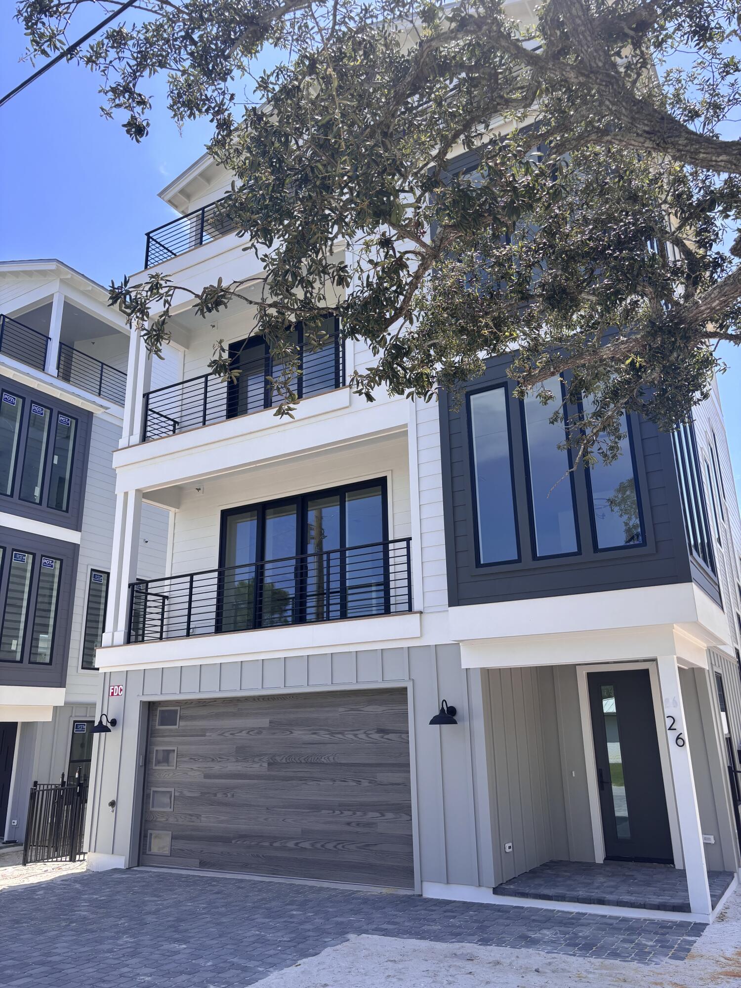 Gorgeous four-story rental dream under construction (June 2025 completion), south of 30A on Mary Street in Blue Mountain Beach. Perfect for indoor and outdoor entertaining with less than a 5 minute walk to the beach, the house features rental income projections of around $235,000. Designed with vacation in mind, the first level includes a half bath and mini kitchen with a full sliding wall that opens to the pool deck. The second floor features the spacious kitchen, dining and living area, perfect for large families or parties to gather. The kitchen features Thermador appliances, a gas stove, ample counter space for serving, and a walk-in pantry. The third floor boasts a lovely master suite with a private balcony. The master suite as well as 2 guest suites with private bathrooms are also available on the third floor, one of which would be ideal for a multi-bunk room. On the 4th floor the home features 2 additional bedrooms with private ensuite bathrooms. Also on the 4th floor is a huge covered deck area with amazing gulf views. The home also features an elevator as well servicing all 4 floors.
The pool deck will also have shaded areas to enjoy as well ample sunbathing space. The beach is just a short walk (less than 5 minutes). The two car garage will be ideal for parking in addition to storing anything you need from beach items to a golf cart.
Blue Mountain Beach is one of the best beach communities on 30A with less crowds on the beach, easy access to restaurants and entertainment.