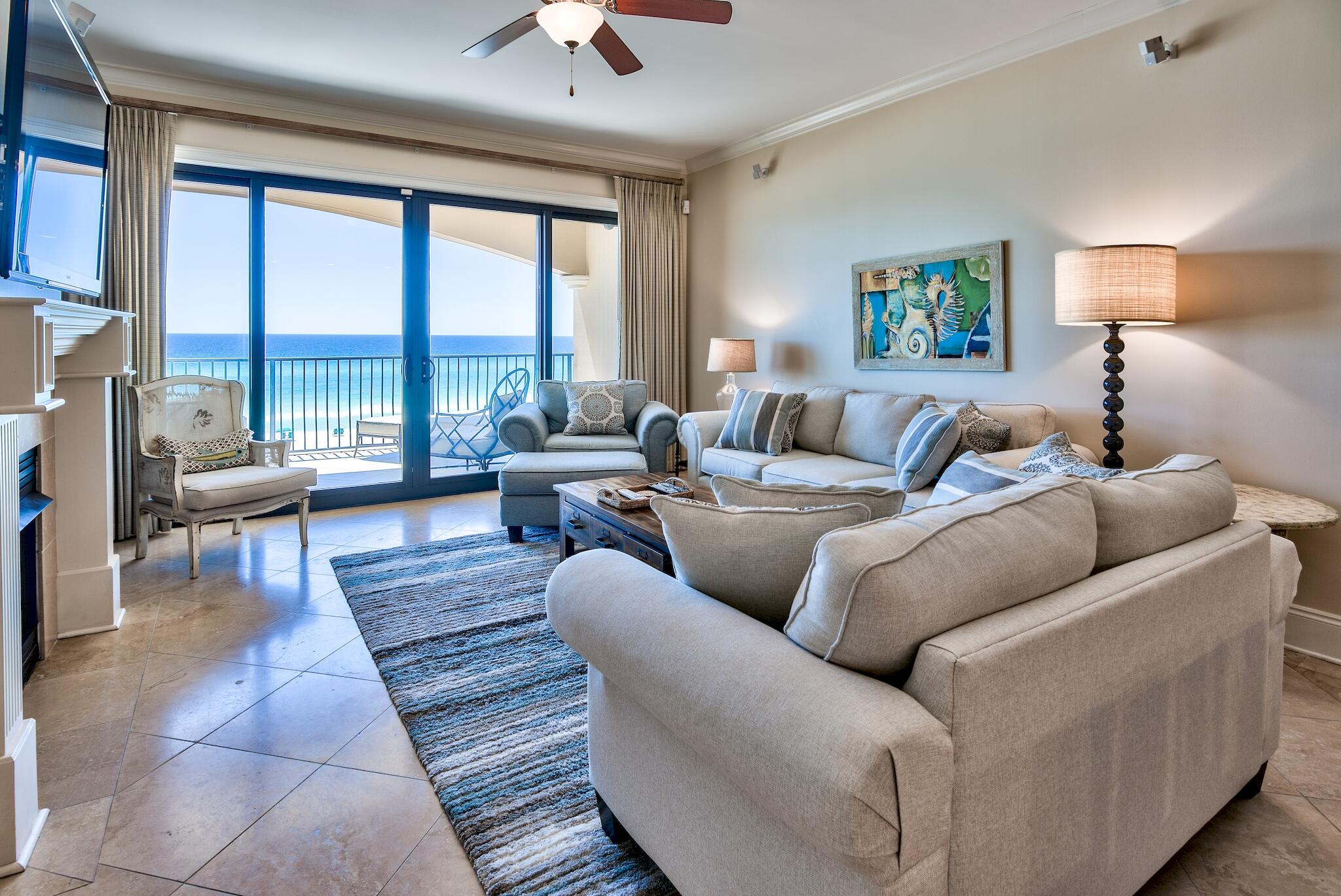 Expansive gulf views from this large, luxurious four bedroom gulf-front condo at Villa Coyaba. A low-rise, low-density condo with over 300 feet of private beachfront property, the location at Villa Coyaba is impossible to beat. These units rarely enter the market, and remain popular among renters. Impressive multi-year rental history. $119K on books for 2021. Residents enjoy spacious covered balconies as well as a gulf-front infinity pool and fitness center. Modern viking stainless steel appliances, and rich granite highlight the fully-equipped kitchen. Living room daylight brings views of emerald waters while evenings beckon relaxation with a warm glow from the gas fireplace. Amenities include a private pool, hot tub, dedicated parking, theatre room, fitness room, and owner storage.
