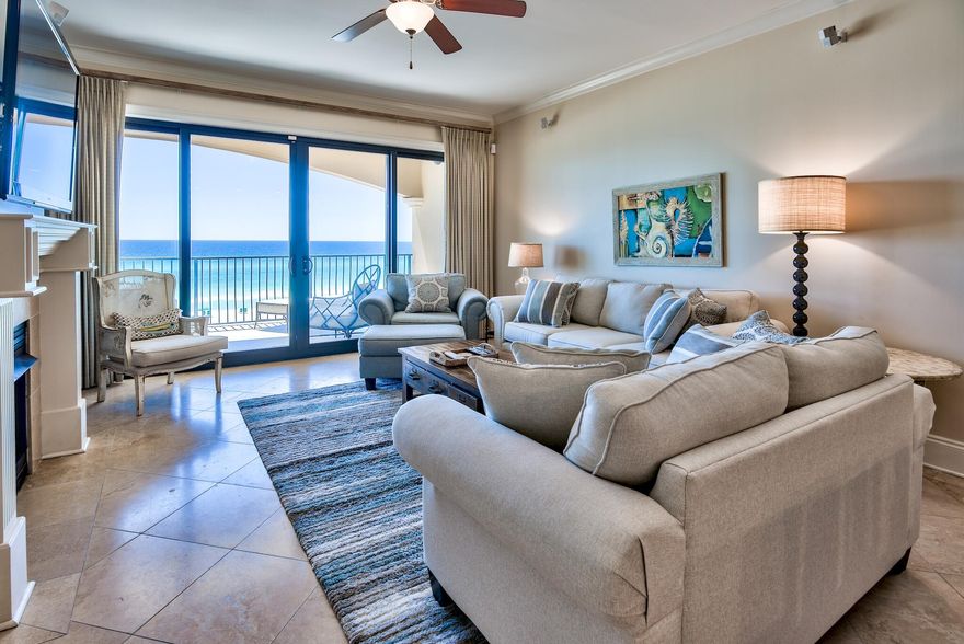 Expansive gulf views from this large, luxurious four bedroom gulf-front condo at Villa Coyaba. A low-rise, low-density condo with over 300 feet of private beachfront property, the location at Villa Coyaba is impossible to beat. These units rarely enter the market, and remain popular among renters. Impressive multi-year rental history. $119K on books for 2021.  Residents enjoy spacious covered balconies as well as a gulf-front infinity pool and fitness center. Modern viking stainless steel appliances, and rich granite highlight the fully-equipped kitchen. Living room daylight brings views of emerald waters while evenings beckon relaxation with a warm glow from the gas fireplace. Amenities include a private pool, hot tub, dedicated parking, theatre room, fitness room, and owner storage.