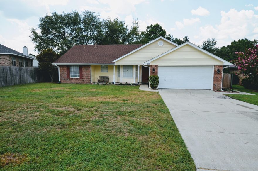 Do not miss this opportunity to live outside of City limits in South Crestview. Located in the popular Cherokee Bend subdivision, this 3 bedroom 2 bath split bedroom designed home has new dimensional shingled roof, large privacy fenced back yard and 2 car garage. Great room design inside, you will find tiled floors in baths, kitchen, dining area and laundry room; laminate in Living room and bedrooms, and sold surface tops in kitchen as well as marble tops in baths. Upgraded crown molding throughout, this home is a must see and won't last long! Call today!