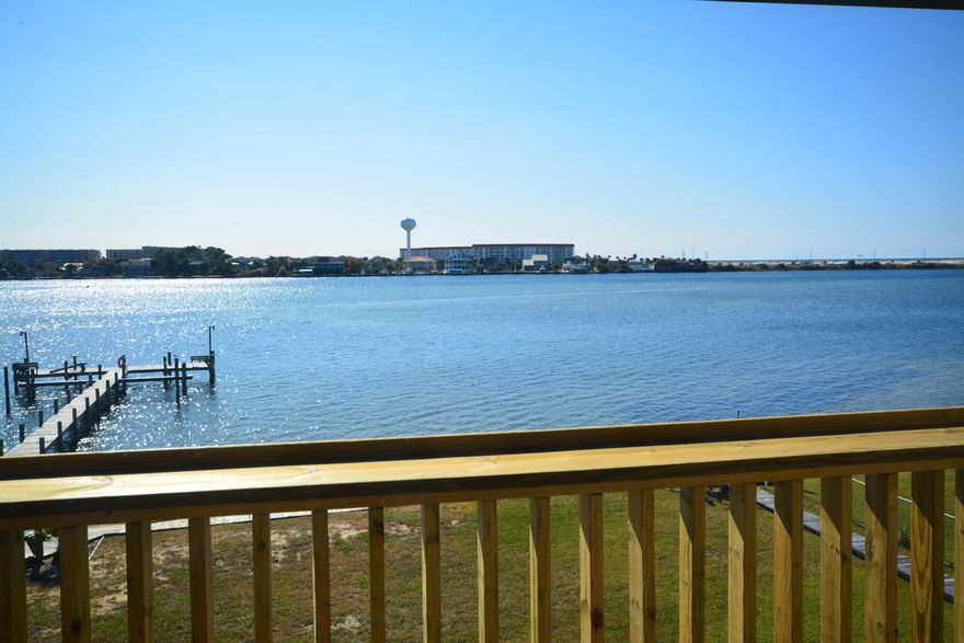 Beautiful soundfront unit with a view of the Gulf of Mexico. It will take your breath away. Community Dock for the complex with boat daydocking and brand new seawall. Unit was totally redone with ceramic tile on the living floor and bathrooms, updated kitchen. Washer and dryer included. Don't miss out on the beautiful views from your own backyard! Available to move in now.