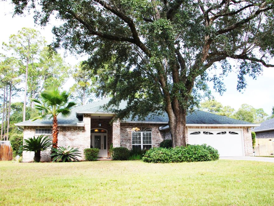 Amazing home on a gorgeous street in one of Niceville's most coveted areas off of Bayshore Drive...with a WATER VIEW! Located on almost half an acre, this 3 bedroom, 2 bath split bedroom floor plan offers many upgrades, to include a Generac 20kw whole home GENERATOR, screened in POOL, surround sound, stainless steel appliances, raised or tray ceilings throughout, built in cabinetry and many more details that you have to see for yourself. The floor plan features a family room and living room, as well as a separate dining room, breakfast area and breakfast bar in the large kitchen. A tropical oasis awaits in the large backyard with a screened in back porch and sparkling, in ground gunite pool. Do you like to travel around the country in an RV? Or maybe you have a boat that needs a home?