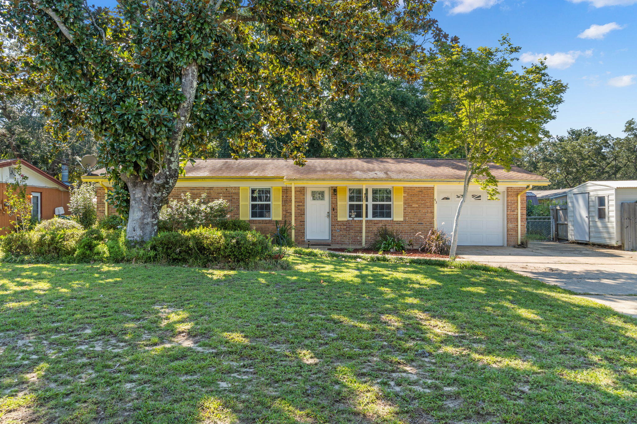 Conveniently located, just minutes to Eglin AFB and Hurlburt Field AFB and a short commute to the beautiful Beaches of our Emerald Coast, restaurants and shopping: don't miss out on this opportunity! This three bedroom, one and a half bathroom home is beautiful and features a fenced in back yard featuring mature pecan, fig, pear, orange and lime trees and blueberry bushes. This home has tremendous potential as a primary residence, second home, or investment property with generous sized bedrooms, granite countertops in the kitchen, and updated appliances, HVAC, water heater and with an acceptable offer - a new roof.