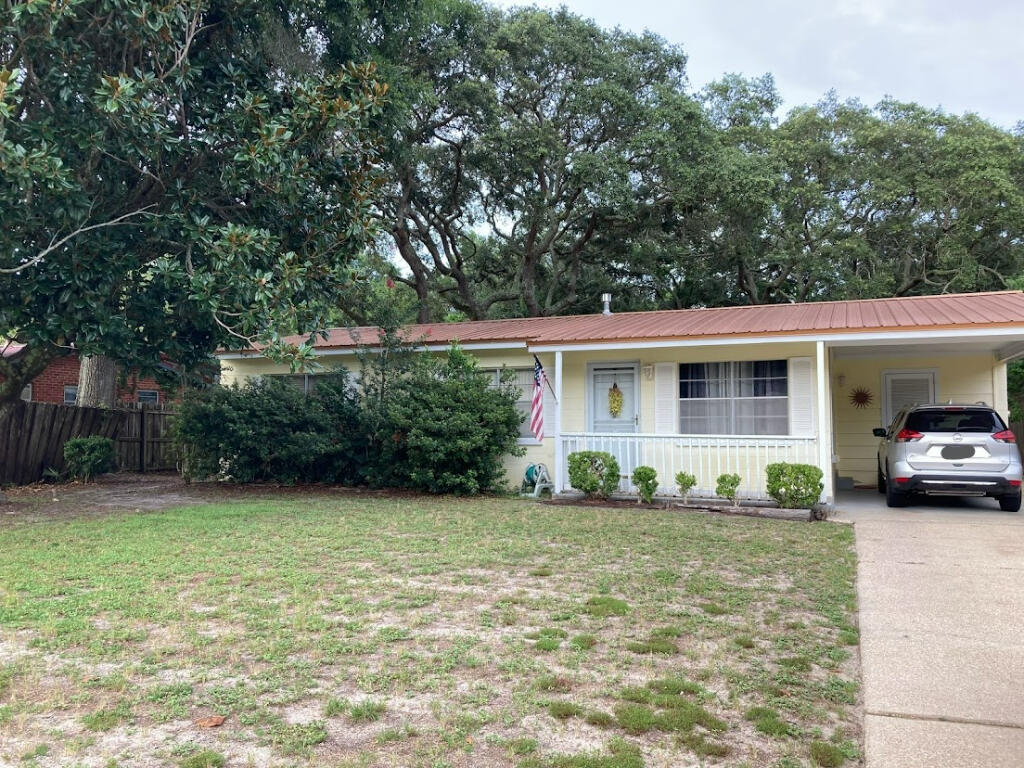 Nice 3/1 home with 1173 sqft off of Racetrack in FWB.Great starter home or rental property with little improvements needed.Attached carport and laundry room with a shed in the fenced backyard.