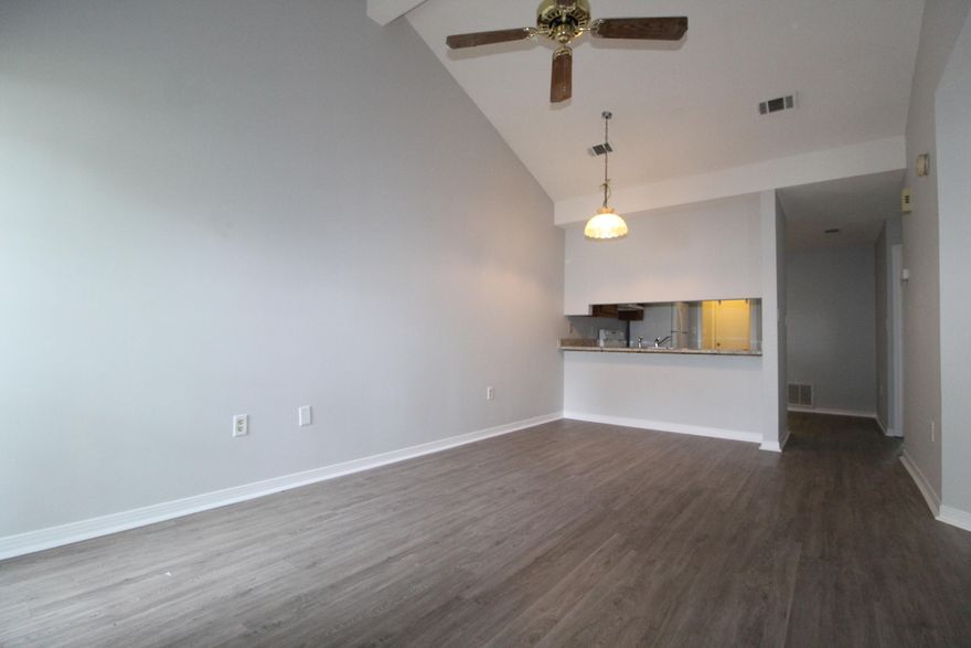 COMPLETELY RENOVATED - GREAT FOR FIRST TIME HOMEBUYER OR INVESTOR! Beautifully renovated townhouse close to Eglin and Hurlburt. Cathedral ceilings in living room and both bedrooms and coupled with skylights and large windows give this home an airy spacious feel. Fresh paint and new vinyl plank flooring throughout. Kitchen features include new granite countertops, a new stove and new refrigerator. Master bedroom has sliding glass doors that lead out to your fenced backyard. Jack and Jill bathroom is great for a roommate setup. Call to see this one fast because it won't last long!