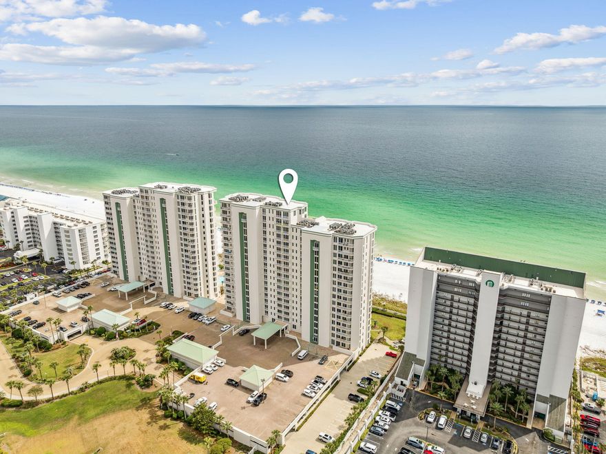 Welcome to Unit 106W At Silver Beach , an exquisite 2-bed/ 2-bath beachfront condo located within the renowned Silver Beach Towers Resort in the heart of Destin, Florida. This modern ground-floor unit offers an open floorplan of elegant living space, enhanced by the stunning views of the resort pool and the Gulf of Mexico, visible right from your private patio.Upon entering, you are greeted by a spacious and stylish living area furnished with contemporary decor, where relaxation awaits. The open-plan design seamlessly flows into a dining area with seating for six and a breakfast bar accommodating two. The fully equipped kitchen, featuring full-size stainless-steel appliances and all necessary cookware, invites you to create unforgettable culinary experiences. The south-facing wall features floor-to-ceiling windows that open directly onto a furnished beachfront patio, providing easy access to the pool deck, community grills, and private beach. 

The primary suite offers a serene retreat with a king-sized bed, and private patio access. The attached primary bathroom is a luxurious haven with a jacuzzi bathtub, walk-in shower, and double vanity. The guest bedroom includes two queen beds, and an en-suite bathroom with a walk-in shower. An additional bunk area with twin bunk beds is perfect ads additional sleeping space

Situated within a gated community, Silver Beach Towers provides a plethora of amenities, including two beachfront pools, a tennis court, a gym, and laundry facilities within the building. The resort also offers beach setup services (available from March 1 to October 31) for added convenience. A designated covered parking spot in the garage, along with unlimited outdoor parking, completes this exceptional offering.

Destin's vibrant dining, shopping, and entertainment scene are mere moments away, yet the tranquility of your private patio with breathtaking water views offers a perfect escape.

Come and experience the refined elegance and unparalleled beachfront living at West 106, where luxury meets comfort in the heart of Destin's stunning co