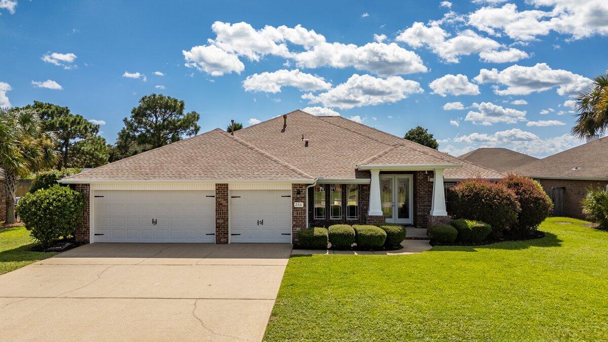 This stunning Craftsman-style home in the Meadows offers the best value in the East Navarre area, boasting fresh paint and a new price! Step onto the covered front porch, perfect for your Cracker Barrel-style rocking chairs, and into a world of comfort and style.Florida Living features;Impressive double ODL front door entry4 bedrooms with ceiling fans & closets3 full bathrooms3-car garageNew roof installed in 2024GuttersAmerican Residential Home Warranty included for Buyers peace of mindHurricane fabric shields and hardware included LVP wood-look floating floors in main living areaKitchen with granite countersMultiple flex rooms for customizationAgreeable gray wall color throughoutCustom built-ins and crown moldingRecessed lighting and updated fixtures