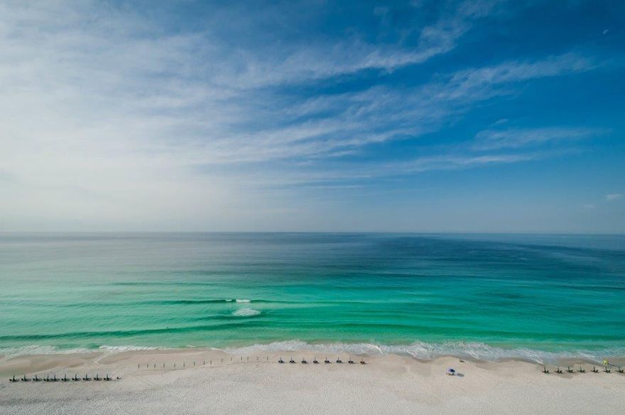 Beautiful penthouse with westerly views of Destin. This low density building is quiet but in the heart of Destin and close to everything! The living area is very large and has amazing views! The oversized balcony offers plenty of room for enjoying the spectacular Gulf of Mexico. The large master suite has a sitting area, and opens onto the balcony. The complex is very well kept and has security, gulf front pool and hot tub, owner's party room, tennis courts, and deeded beach access. It is conveniently located close to many great restaurants and shopping yet somewhat tucked away from Highway 98 for more privacy.