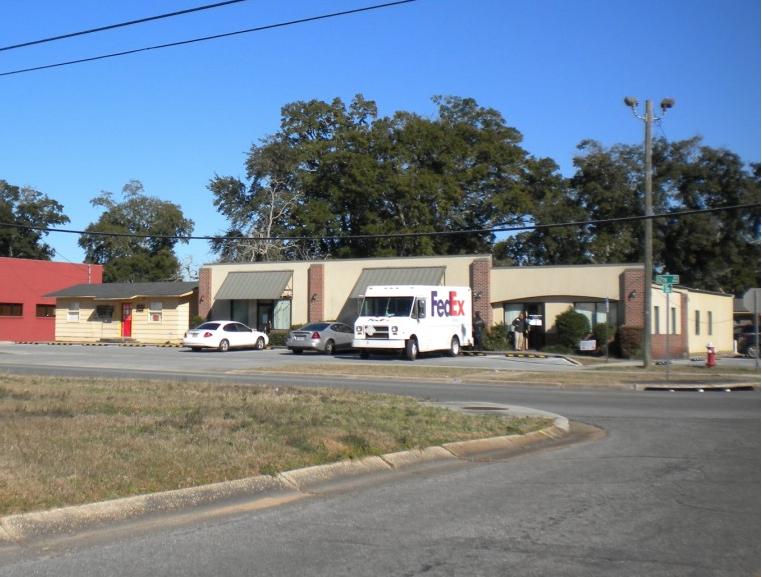 5000 SF retail building located at the corner of Scott and 12th Ave