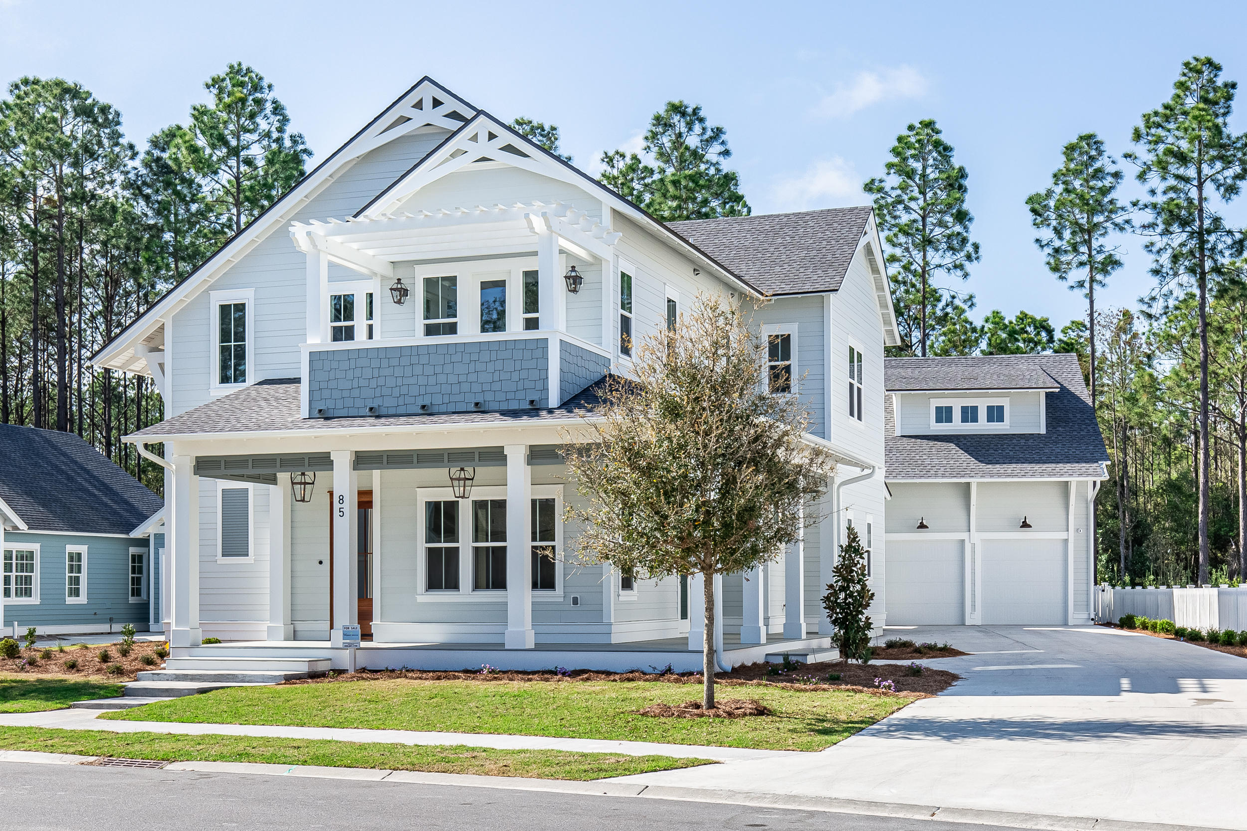 This beautiful custom-built home in Watersound Origins offers many WOW features not found in most homes. Every square inch of the home was meticulously designed for entertaining and relaxation. Wrap around porch with 2 entrances into house- one into the welcoming front entry with barrel ceiling. Junior owner's suite on first floor with private bath with stunning, bold tile. Soaring 11 foot ceilings on 1st floor and 10 foot upstairs. Living room features beamed ceilings, linear fireplace and lots of windows to let in natural light. True chef's kitchen with Thermador 48'' gas range, custom hood, Frigidaire 30'' fridge, 30'' freezer, separate steam oven and drawer microwave. Spacious walk in butler's pantry with lots of shelving makes organization a breeze.