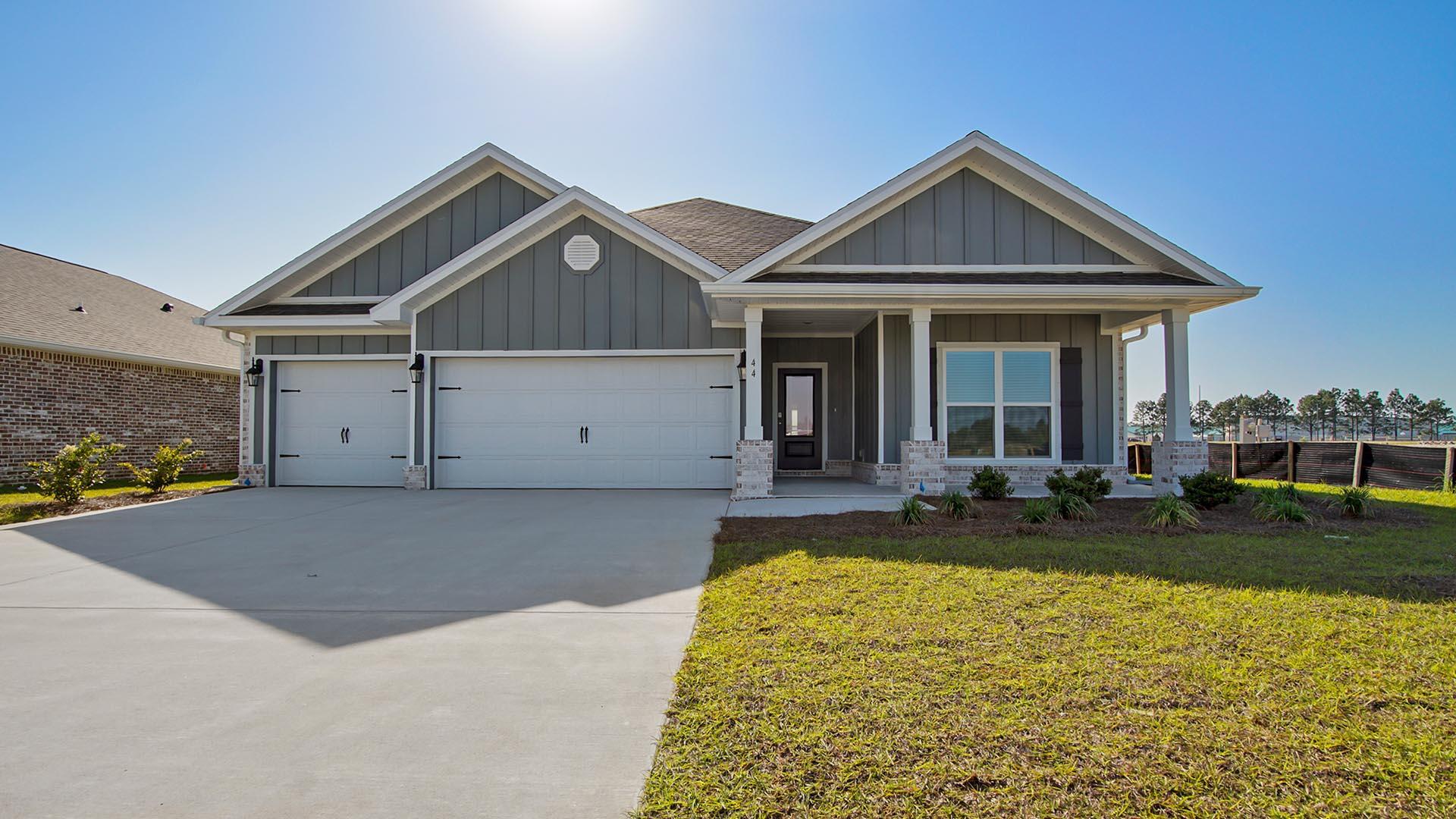 The Madison floor plan is a single story, 4 Bed, 3 Bath home with 3 car Garage. As you enter the foyer you are greeted with two guest bedrooms and a shared guest bathroom. Across the hallway you will find the laundry room, linen closet, and a third guest bedroom. The well-appointed kitchen overlooks the living area, dining room, and covered lanai. Entertaining is a breeze, as this popular single-family home features a spacious quartz kitchen island, dining area and a spacious pantry for extra storage. The Primary bedroom is located off the living space in the back of the home for privacy and its bathroom impresses with double bowl vanity, spacious shower and soaking tub as well as a large walk in closet.