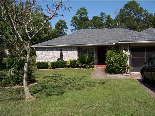 Lovely Home on 10th green of Golf Course. Well maintained lawn and shrubs with Fruit tree in back with Garden Area. Brick Siding on Home with fenced back yard. Front entryway opens to spacious Family Room with Fireplace and wood flooring. Cathedral Ceiling in Family Room. To right of Entryway is formal Dining Room area with door to open/bright Kitchen and Breakfast Area. Tile floors throughout the Breakfast Area, Dining Room, Laundry room and Bedrooms. To left of Entryway are Three Bedrooms. Master Bedroom with Master Bath, Double vanity, walk in Closet. Other Two bedrooms share bath with renovated Shower area. Garage has screen covering over door, for additional outdoor living enjoyment. NON SMOKING UNIT. SMALL DOG CONSIDERED. NO CATS