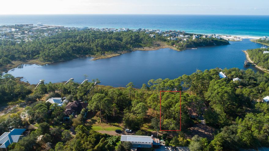 Large lot on Draper Lake with views of dunes and gulf. Rare opportunity to build in an intimate community tucked away yet accessible to everything Blue Mountain and 30A have to offer. Boat dock permittable, so you can kayak, paddleboard, or have a small motorized boat to get to the beach easily. Renderings are conceptual only, there are no plans to convey with the lot.