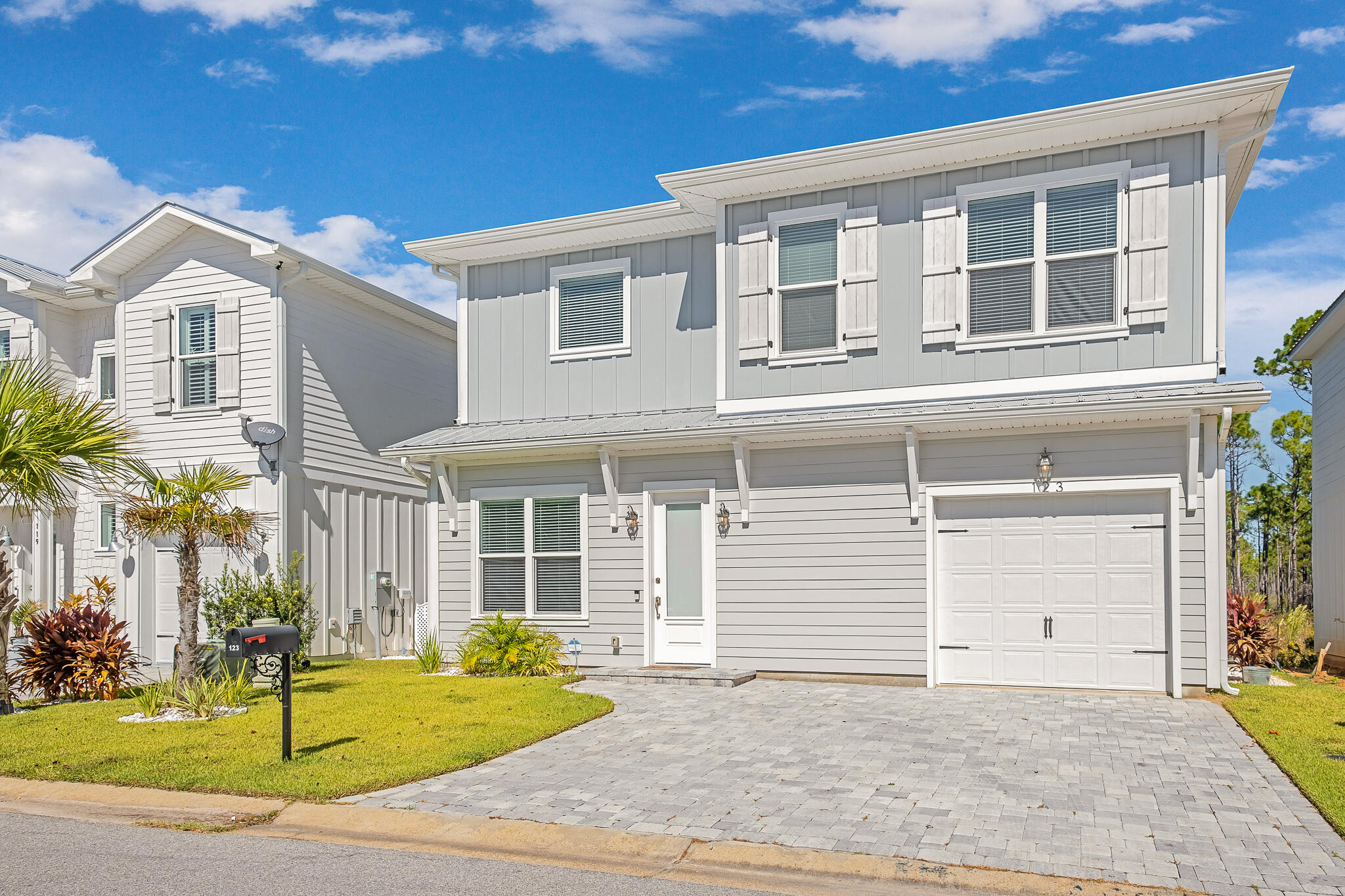 123 Woodshire Drive is a beautiful home in excellent condition located just a short walk or drive to the beach. This is one of the most competitively priced homes located SOUTH of HWY 98. The bike path at the entrance to the community takes you all the way to 30A where you can head to the beach or walk/bike to all the restaurants and shopping at Gulf Place. 10 foot ceilings welcome you into the open living room. The living and dining flow into the custom kitchen creating one continuous entertaining room. The second level features the master bedroom suite plus two additional bedrooms, additional bathroom and washroom. The master bath features dual vanities, glassed in shower, soaker tub and walk in closet. This is a low maintenance well-built home that is move in ready today.