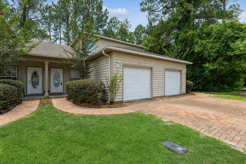 Upscale townhouse conveniently located near Eglin AFB, Duke Field, 7th group, Hurlburt Field and Northwest Florida State College. Well appointed kitchen with new granite countertops, tile backsplash, under cabinet lighting and stainless steel appliances. The master bedroom and bath is downstairs and the two additional bedrooms are upstairs. Private back covered patio perfect for entertaining. All lawn maintenance is included in the HOA. Single car garage and brick paver driveway. Call today to schedule an appointment to see this great townhouse.