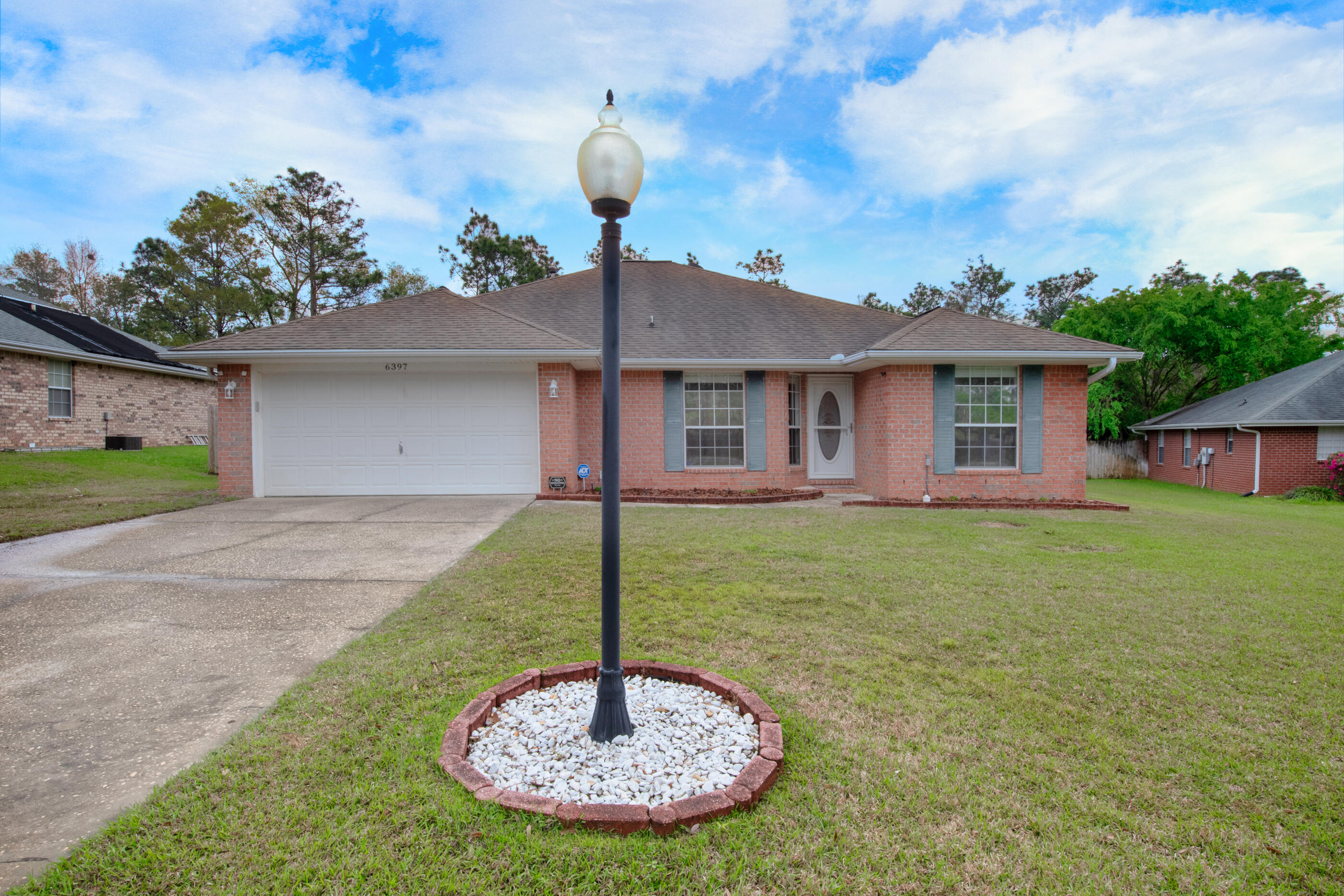 Back on the market-- no fault of seller! SILVER OAKS SUBDIVISION.. PICTURESQUE POND VIEW.. $40,000-PLUS IN UPGRADES.. NEW ROOF COMING SOON.. AND THIS HOME BACKS UP TO GREEN SPACE! This 4 BR/2 bath brick beauty is located in one of Crestview's most highly sought after neighborhoods; courtesy of the community pool, the playground, the sidewalks and so much more! The split floorplan is spacious, with brand new ceramic tile/luxury vinyl plank flooring throughout (including the master suite). Checkout the brand new cultured marble walk-in shower (with glass entry) in the master bathroom! The living room has vaulted ceilings with a fireplace at its center. The kitchen boasts a new backsplash and a GAS STOVE! There's also a formal dining room, as well as designated office space. (continued)