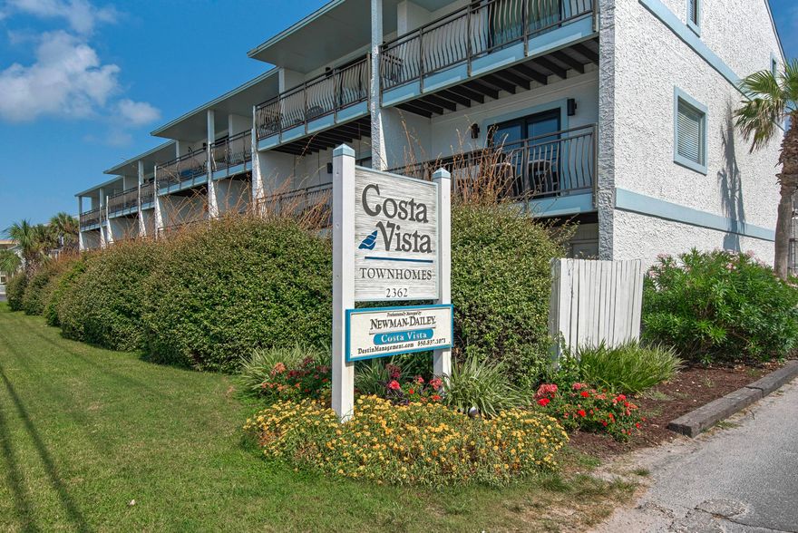 GULF FRONT VIEWS from 2 levels in this desirable and renovated Miramar Beach townhome! Fully furnished and ready for the rental market or a primary residency - qualifies for a VA loan, too! Epic location directly facing the Gulf, across the street from beach access, near Pompano Joe's and the bicycle path along scenic Hwy 98. Renovated and turn key, the interior of this unit features updated details of painted plank ceilings, wood planked walls, Carrera marble tile, hardwood floors, solid doors, granite counters, and tiled showers with custom glass doors! The open and spacious kitchen includes stainless steel appliances, beautiful grey cabinets with an abundance of storage, granite counters, and breakfast bar. The dining room, living room and kitchen