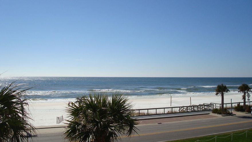 Welcome to your piece of ''Paradise''. This hidden gem boast spectacular views - from sunrise to sunset and offering water views from every room in the unit. A fabulous open floor plan with 2 master bedrooms. 10 Ft. Ceilings, 2 balconies -south balcony overlooking the gulf and the north balcony overlooking Steward Lake. Kitchen offers granite counter tops, upgraded oak cabinetry and stainless steel appliances. Tile flooring- cultured marble showers and tubs with granite vanities in all 3 baths.Newly painted interior - tastefully decorated -All appliances new in 2014. Separate storage unit included. Gated complex - swimming pool - hot tub and fitness room.