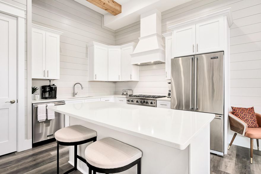 $20,000 FURNISHING ALLOWANCE OFFERED BY SELLER TO BE PAID AT CLOSING. Steps to the beach in the heart of Seagrove, this home has a modern aesthetic with warm, coastal touches throughout. The main floor maintains an open concept from the kitchen to the living area that carries out to a balcony space with Gulf views. The fully equipped kitchen features a large island for additional preparation or serving space and offers bar seating that is perfect for entertaining large parties after a day at the beach. Fully stocked, the kitchen showcases stainless steel Viking appliances and is gas friendly. On this floor you will find 2 bedrooms, each with their own en-suit. Additionally, there are 2 laundry spaces for added convenience, one on the main level and one on the third And, as an added bonus there are 2 twin, built-in bunk beds for guest use or relaxation. The third floor has four bedrooms and three full bathrooms, with bedrooms 5 and 6 sharing a Jack and Jill style bathroom with walk-in shower.  The Primary bedroom is nearest the front of the home to highlight the beautiful gulf views from a private balcony. The Primary has a private en-suite with dual vanities and a large walk-in shower with glass enclosure. Head downstairs to enjoy a large outdoor space with a to covered patio, heated swimming pool, outside shower, and grilling area.  This space is tiled throughout and provides an outdoor dining area perfect for entertaining. There is additional storage and an owners closet, as well as, the elevator entry on this entry floor. The home as a single, covered carport space and 2 additional driveway spaces for parking. Cote D'Azur maintains private beach access directly to Seagrove Beach, a short walk across the street from the property. This area is golf cart friendly and is in close proximity to many local restaurants and shops. 

Special features include but are not limited to: 5 King beds in each spacious bedroom plus 2 twin bunks perfect for peak rental potential. Each bathroom maintains stunning tile shower detailing with glass enclosures. With three floors, the home has an elevator for easy accessibility. Luxury Vinyl Plank can be found throughout the home with iron railings showcasing the staircases to add a modern flare. Lastly, the patio area has a stucco privacy fence surrounding for optimal seclusion. 

The neighborhood is short-term rental friendly and the home currently is on a vacation rental program, self managed. The home is being sold fully furnished. Start your permanent vacation, today! Seller financing options available.