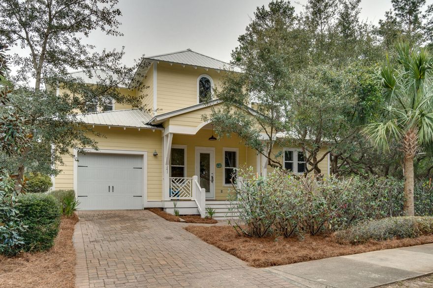 Sunny Daze is conveniently located south of 30A on Lakewood walking distance to the beach. On the open plan first level you will find a large kitchen and living area with 10' ceilings. The master bedroom and bath are also on the first floor allowing privacy from the two second floor bedrooms. Good closet and storage space. Community pool close by with mature landscaping and plenty of deck space. Nearby public beach access has PUBLIC beach space owned by the county. Eastern Lake boat ramp for canoes and kayaks close by. Call to schedule an appointment today to see this sweet 3 bedroom/2 bth Florida Cottage designed home.