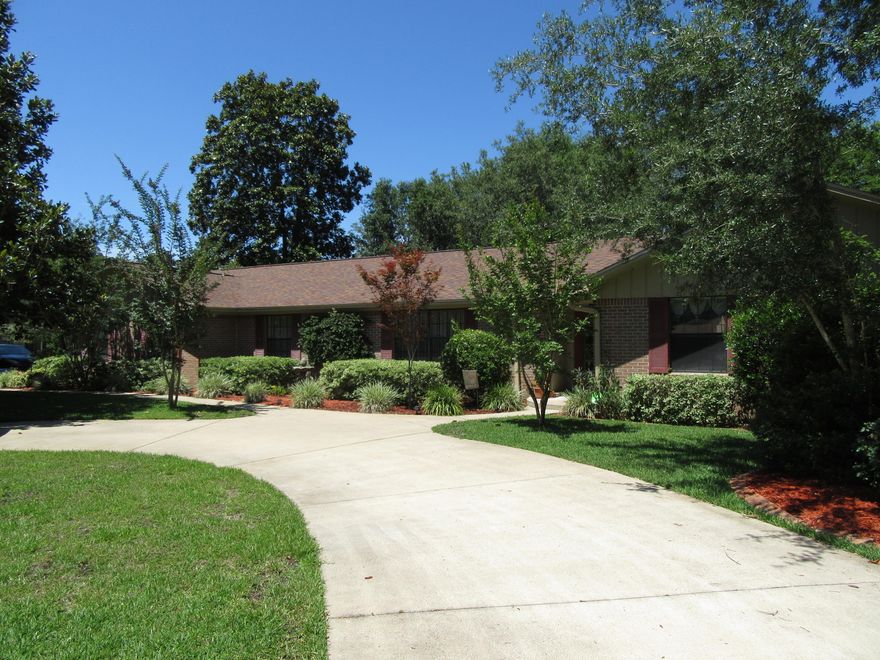 Immaculately maintained move-in ready single level home inside and out! Upgrades and updates throughout, including a large master suite addition, walk-in closet, tray ceiling & adjoining office (or nursery) & screened patio with vaulted ceiling. 2 fridge/freezers w/ ice convey. 2 new HVACs, main in 2012, and master suite in 2016. New roof November 2013. New H2O heater 2011. Active valid termite bond. Built-in shelving & ceiling fans throughout. Granite and wood floor upgrades. Oversize side entry garage with shop area. Circle drive in front. Home security system. Large level corner lot neatly landscaped with perfect sun v shade mix, gas-piped grill, 6-zone sprinkler system, landscape lighting, buried invisible dog fence and swingset with screws only and treated wood