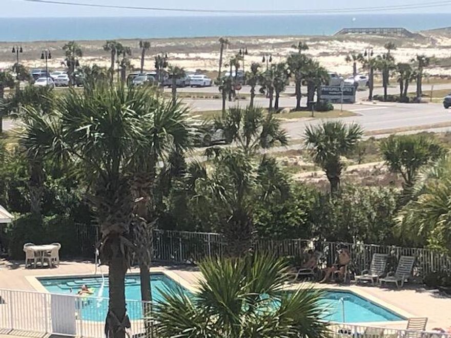 Own your own part of the Beach! Great location, Great Views, Great little Condo. This top floor beautifully furnished unit can sleep up to 6. Queen size bed in bedroom, bunk beds in the hall and a queen sleeper in the living room. Granite counter tops, Stainless Appiances and competely funished down to the plates and spoons. (Linens and lock box are property of VACASA and will be removed if you do not wish to have them manage the property.) 2 full bathrooms and an a washer/dryer in place. The views from your balcony are amazing. You can see the Navarre Pier all the way across to the community pool and past,to views of the Gulf. Public Beach Access is just across the street, so you are steps away to the white sands on Navarre Beach. Large parking lot with racks for bikes and more.