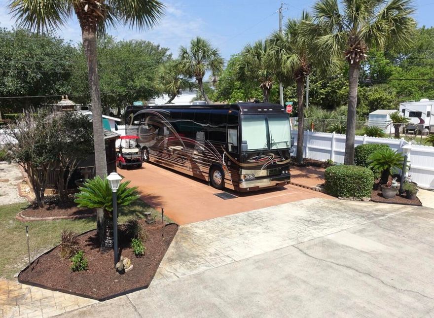 Oceanside, the Exclusive 'Class A'/'Super C' Motorhome 15 Lot Gated Community, with a Pool & only 2 blocks from the Beach. Enjoy the privacy of the largest End lot located on the West side, across from the Pool & Pool house. Lot 15 is a spacious lot with new landscaping & added Composite Decking outside the Screened Gazebo with Seating Area, Stove, Sink & Storage. The Storage House has Air Condition & is smartly finished with built in Cabinets & countertops providing ample storage. NON-rental Gated Community of 15 lots with Palm trees, sprinkler system, Pool, Pool House with Laundry, Restrooms & Shower. $2500/yr HOA Fees include Ground Keeping, Irrigation, Security Gates, facilities, Community Pool, Sewer, Water, Trash. Owners Pay Electric & Cable.2 Pets with Breed Approval. NO 5th wheels. Conveniently located 2 blocks from one of South Walton's largest Public Beaches, parking areas, public bathrooms near Pompano Joe's Beachside restaurant,Bike/Pedestrian Path & Manmade Reef. Grill, Fountain & Chairs in Gazebo Excluded from Sale. NO 5th Wheels or Trailers. NON-RENTAL PARK. Buyer Pays $500 Capital Contribution at Closing. Seller also has 2012 Prevost Entertainer Coach, with 1 Bedroom/Bath/Shower & Kitchen for Sale $399,000.