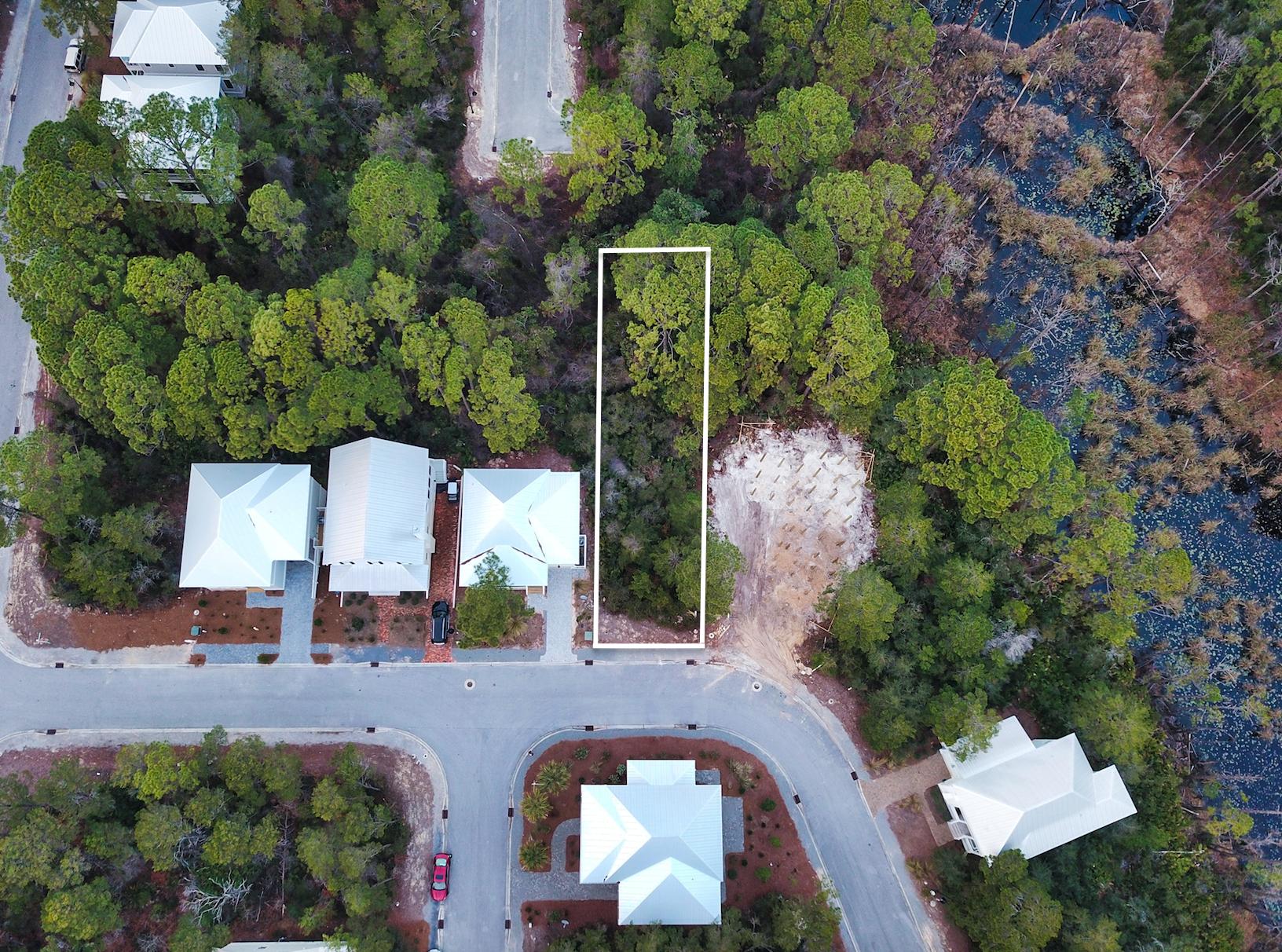 This is a fantastic development opportunity in one of the most secluded locations just off of Hwy 283 and Scenic 30A West. Enjoy owning a beach house in the heart of Blue Mountain Beach within a close proximity to endless amenities including a nearby public beach access, bike rentals, shopping, dining, the popular Blue Mountain Creamery, nature trails for hiking and dedicated private trail access to the popular Redfish Village. Lakeside at Blue Mountain Beach is a 128 lot community that is nestled just north of Redfish Village and borders Big Redfish Lake, one of South Walton's rare Coastal Dune Lakes that outfall into the Gulf of Mexico. Community amenities include a pool and a clubhouse. Don't miss out on this amazing opportunity to build your own custom retreat at the beach
