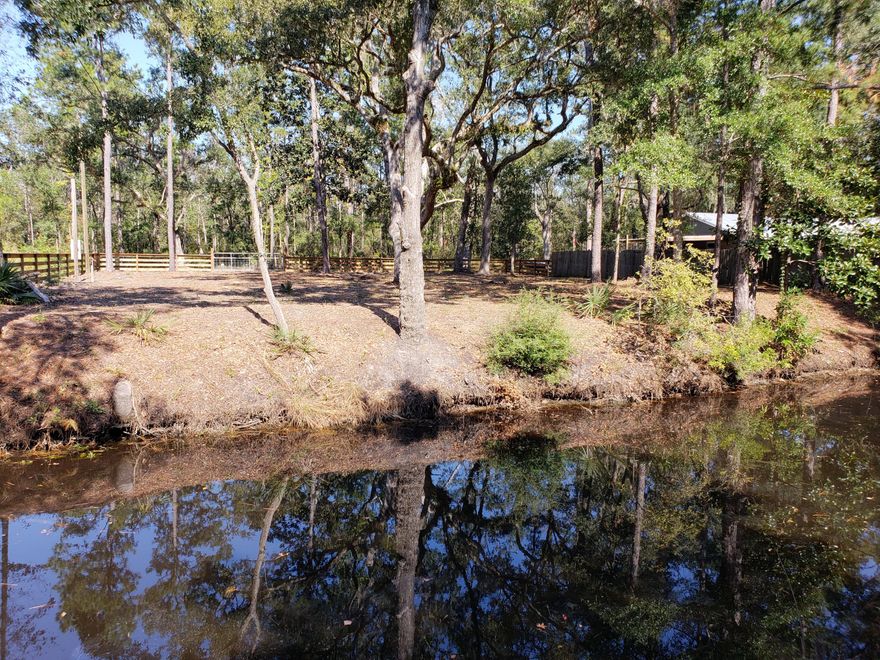 Enjoy water access to the Bay from this canal front lot, only minutes to South Walton. The large mostly cleared 100 ft x 150 ft lot allows ample room to build and keep the large oak trees. Water tap fees have been paid and both water and power is on site and connected. Great fence bordering the property except on waterfront side. No HOA. Survey shows most of the buildable footprint being in Zone X, where flood insurance is not required.