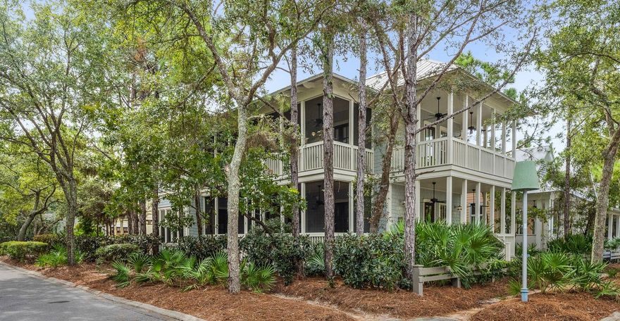 Located in the heart of the Camp Watercolor district, this amazing home offers not only a fantastic location, but a truly unique setting with lush landscaping and mature trees.  With a corner lot and four porches, you can sit back in a variety of porch swings or rocking chairs and enjoy coastal breezes and the resort lifestyle that is truly Watercolor.  A wide open kitchen joins a open concept dining and living room with an abundance of windows and doors opening to a screened porch to have even more space to live and play.  With on suite baths in every bedroom and a separate carriage house, this home can be a fantastic full time, rental or second home for a true getaway.  Wide plank wood floors, shiplap walls and custom tile bath and showers round out this beautiful home.