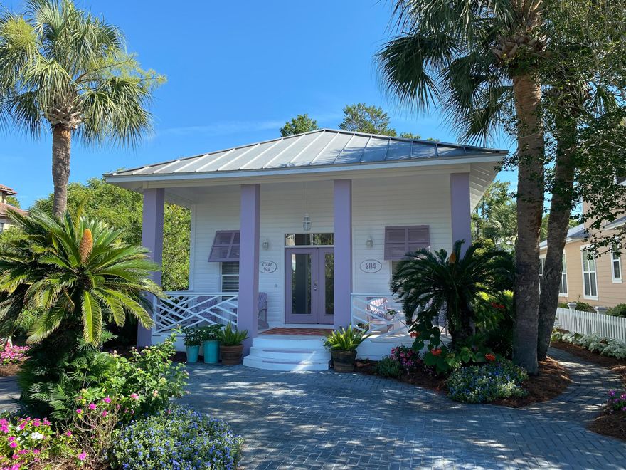 While this cozy cottage oozes with charm, it is surprisingly draped with sophistication in its finishes & appointments. This charming cottage is situated on a cul-de-sac in the coveted neighborhood of Olde Towne. An inviting front porch is perfect for enjoying your morning coffee or relaxing after a day at the beach. Upon entering the home, you will be immediately impressed with the 12-foot ceilings and natural light coming from all the windows and doors that encase the living and dining rooms. Each door and window features plantation shutters or blinds and a transom window above each. Off the living room is a quaint pavered patio for relaxing, grilling, etc. The kitchen has been wonderfully updated with new shaker style cabinets, granite countertops, and all new appliances to include: