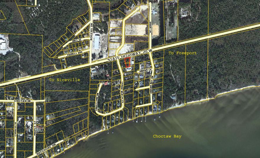 Very nice building lot on the Bay side of Hwy 20 midway between Freeport and Nicevile and close to the Choctaw Beach public park and boat launch.