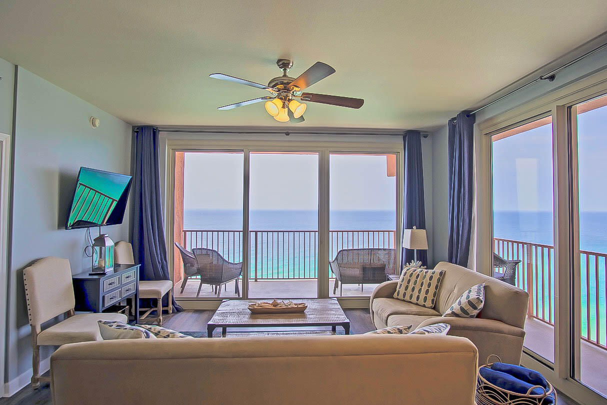 Gorgeous condo perched over the beautiful white sands and gulf waters with breathtaking panoramic views of the gulf. This condo has a large wraparound balcony in the most desirable part of this lovely building. This condo has the prime location with sweeping south and western views of the gulf. Newer flooring and furnishings along with stainless steel appliances and granite countertops checks all the boxes for that special getaway. The large resort-style pool feels like you are vacationing at a tropical resort. New water heater, ac unit, dishwasher and microwave are a few of the recent upgrades. Whether splashing around in the gulf or relaxing under a swaying palm tree by the pool, this is a getaway where memories are made. Close to shopping, restaurants and family entertainment venues.