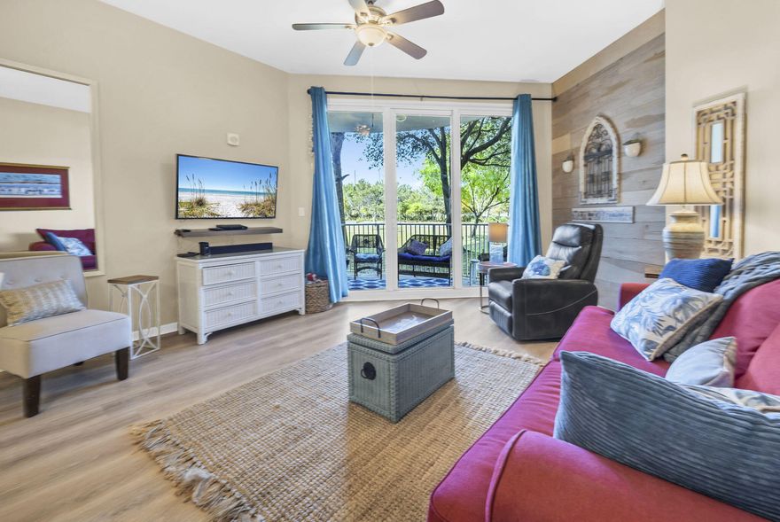 Just steps from the resort-style pool, yet tucked away enough to enjoy a quieter, more private setting, this condo offers the best of both worlds at The Palms of Destin. Located on the first floor, it provides easy access with no elevators, making it especially convenient for families and guests. Featuring high ceilings and floor-to-ceiling glass create a bright, open layout filled with natural light. This 2-bedroom, 2-bath design features a king suite and a second bedroom with a full-size bed, both with private ensuite bathrooms for added comfort and privacy. The spacious patio is perfect for morning coffee or unwinding in the evening with a glass of wine, offering a relaxed coastal feel without the noise of being directly on the pool. Buyer to check all measurements!! Thoughtful updates throughout include LVP flooring, updated appliances, and a newer water heater and HVAC, making this a low-maintenance, move-in or rental-ready opportunity. One of the biggest advantages is that HOA dues cover electricity, water, cable, and high-speed Wi-Fi, making ownership simple and predictable. The unit carries a clean Destin coastal style and works well as a short-term rental, second home, or primary residence. The Palms of Destin is known for its 11,000 sq ft lagoon pool, heated pool, hot tub, splash pad, and kids pool. Additional amenities include a fitness center, tennis courts, pickleball, basketball, grilling area, and on-site dining with coffee shop, tiki bar, and sports lounge. When you're ready for the beach, complimentary shuttle service makes it easy to reach the Gulf in just minutes, while still being centrally located near Destin's top restaurants, shopping, and entertainment. This a turnkey, income-producing opportunity with strong rental potential in one of Destin's most popular resorts. Buyer to verify all dimensions.

