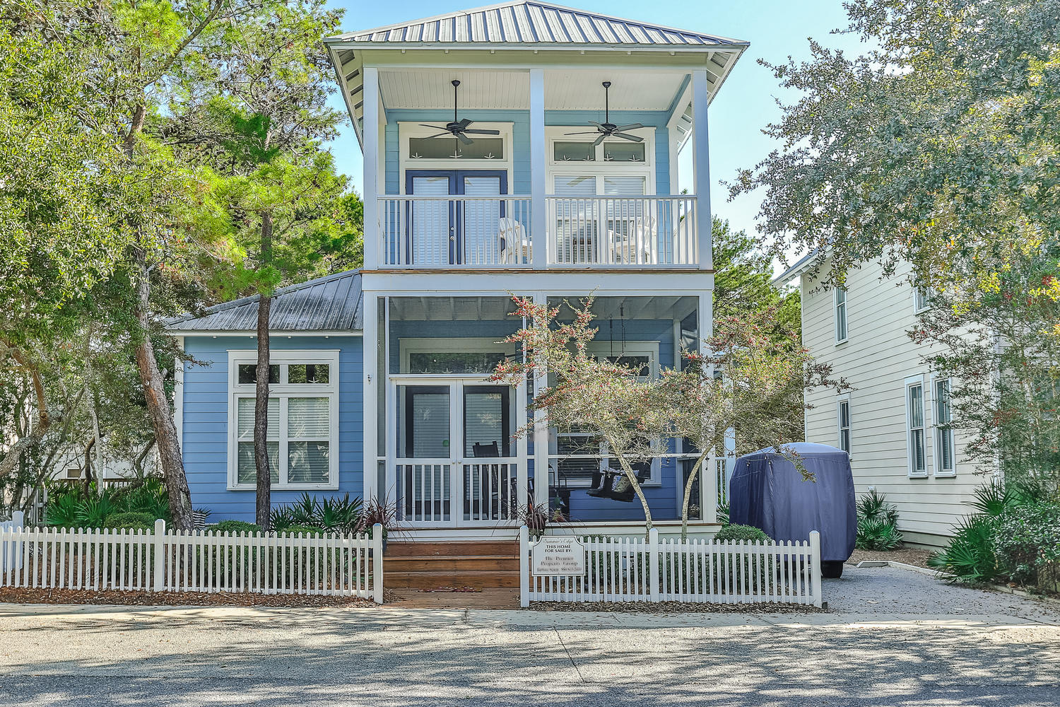 Charming and well maintained Florida cottage located just a short walk to the beach. Deeded beach access. Open floor plan on the first floor. Great for entertaining. Master bedroom is on the second floor with two bedrooms on the first floor. Approx. 350 sq.ft. of covered porches, with a screened porch off of the first floor living area. Enjoy one of two community pools. One pool is heated. Selling mostly furnished with major furniture items remaining. Room dimensions are approximate.