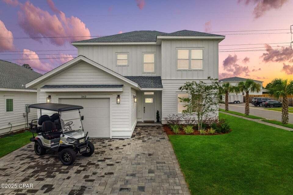 Laguna Haven is a gated Community nestled on the coveted West End of Panama City Beach, close to 30A and Pier Park, but tucked far enough away that the Community gives a serene and tranquil ambience. This Fully Furnished Del Sol floor plan features 4 bedrooms and 3 full bathrooms. Exterior features include cement hardie backer board siding, extension on back patio for entertaining, paved driveway and is beautifully landscaped. The home is exceptionally well-built to include 'Tie-max'' system, that is used to utilize long threaded rods and truss clips to tie the roof to the concrete slab. Additional exterior features include two entry gates, sidewalks with lighting, covered mailbox area and plenty of landscaped green space to enjoy. Step inside the home to find wood-look porcelain tile, crown molding, quartz countertops and a large open floor plan. The owners did not miss any details or spare any expense when adding a game room, office space, gym, firepit area outside and a playroom for the kids. Golf cart not included in the sale. Would make a Fantastic Primary Residence or Vacation Rental. This Pristine Home is Turnkey and currently an operational Airbnb with over 60k in revenue for 2024 and trending ahead of that for 2025. Approximately one mile to the Emerald Waters and White Sandy Beaches. Call today to schedule a private showing.