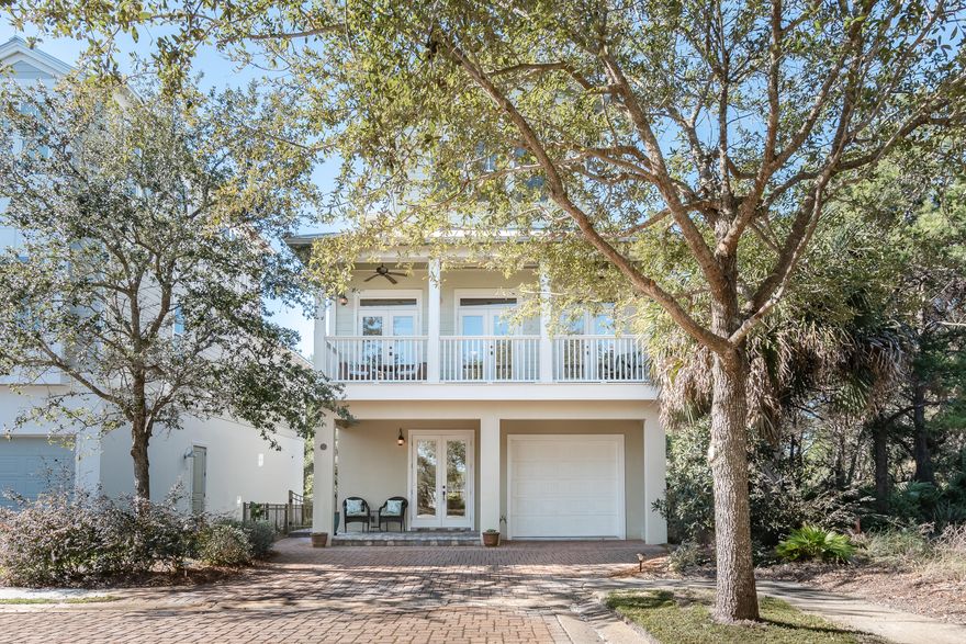 Less than 250 yards to the beach access and under $1 million! It doesn't get much better than this. Enjoy the beautiful gulf views from the upper levels and the serenity of sitting in the sun room off the 3rd floor bedroom. There is also a screened in balcony on the 3rd floor to enjoy the cool night breezes. This home features 4 bedrooms and 4 1/2 baths. Many furnishings are new and the interior has been freshly painted. There are bedrooms on every floor to accommodate many guests. This house is great for a second home or rental. Although the house has not been on the rental program, the projections are very good. This house is a rare find with 4 balconies, gulf views and a garage all under $1,000,000 and so close to the beach!