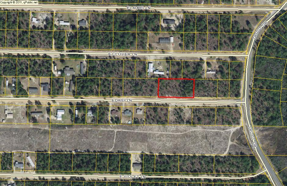 THREE LOTS IN OAKWOOD HILLS! -- Price includes (3)adjoining .23 acre lots for a total of almost .7 acre. This parcel is perfect to build your dream home on, or put a mobile home on each lot -- your choice. The property is currently lightly wooded and there is power and water available on the street (tap fee due). Don't miss this opportunity to get these 3 lots for an excellent price. (FYI -- Property Appraiser's office lists this parcel as .9 acres, but measurement shows it is .69 acres). All measurements and acreage are approximate and need to be verified by Buyer at Buyer's expense).