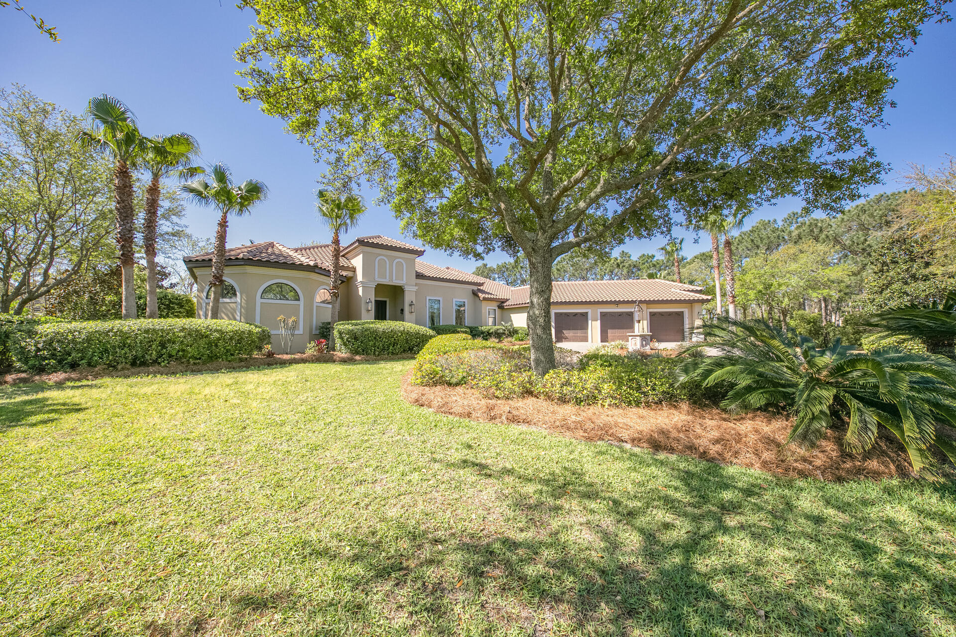 Fantastic fully furnished home! This open floorplan ensures a good time. It has a professional grade outdoor kitchen that make cooking fun. The front door opens to gorgeous views through the home overlooking your pool, a lake, then the golf course. Most of the living area is on the first floor, including the master and two other bedrooms. Upstairs are two bedrooms and a open living area as well as a giant balcony overlooking the back yard.This home is located in the Kelly Plantation Estates the lots and homes here are truly estates, this lot is 1.71 acres! It overlooks the Waterford fountain and offers easy access to both Kelly Plantation entrances.The owner has made a lot of improvements since he purchased in 2019 including: furnishing with great coastal furniture and accents, resurfaced
the pool, rescreened the pool enclosure, installed 2 tankless instant water heaters, added pavers improving the driveway, replaced an a/c system, new LED lighting throughout, landscaped, installed glass bath surrounds in the guest bathrooms, added barndoors to ensure privacy in some bedroom baths, and more making this home up to date.