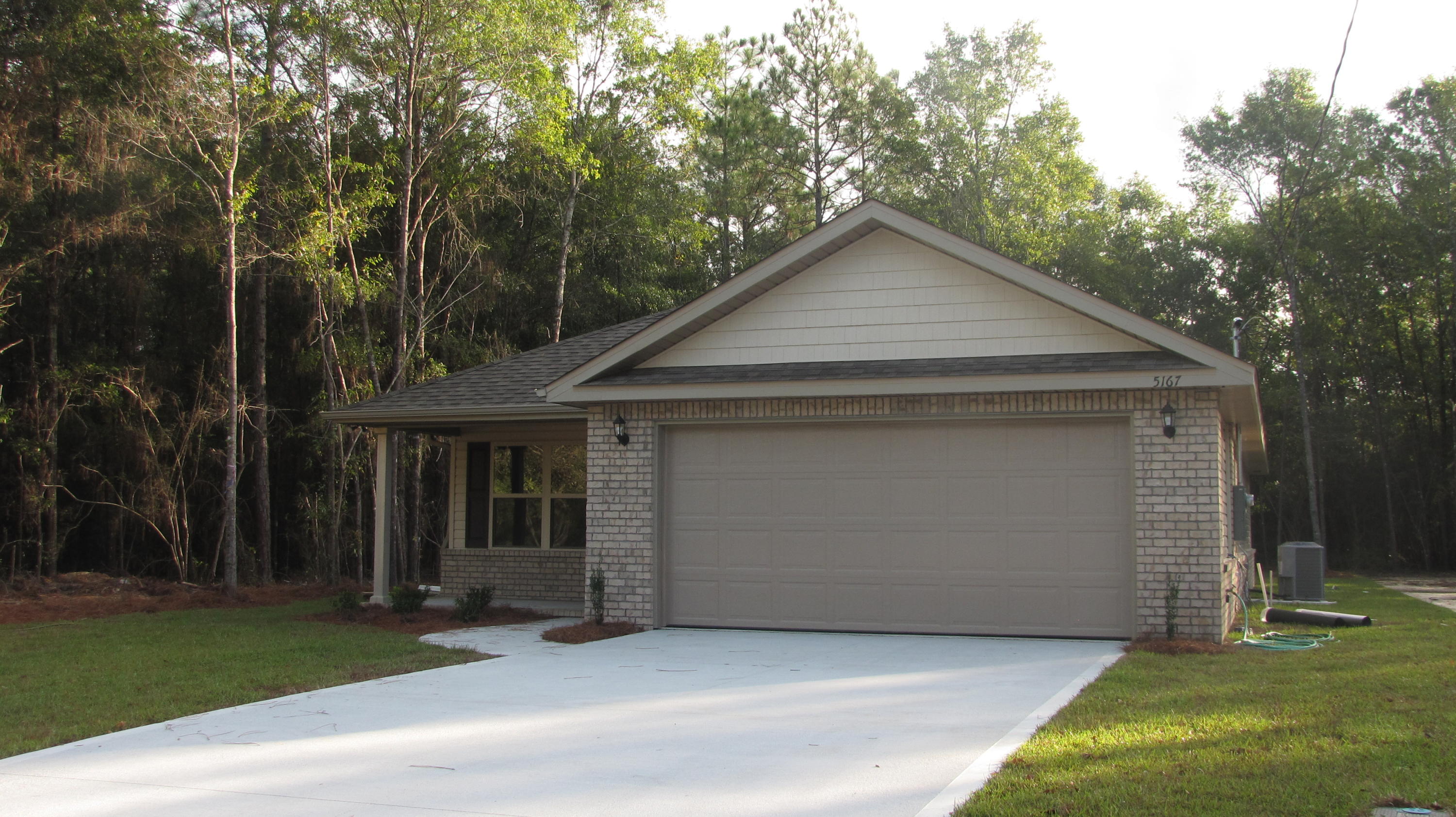 SELLER TO PAY MOST CLOSING COSTS, OFFERING A $500 ALLOWANCE FOR BLINDS AND WILL BE ''MOVE-IN READY'' IN 15 DAYS OR LESS... located centrally in Crestview, the exterior of the home consists of brick and vinyl siding and boasts a 2 car garage. Featuring a great floor plan, the living room is open to the kitchen/dining area; custom cabinets with coordinating counter tops; double-door pantry for additional storage; flooring consists of laminate, tile and frieze carpet. Master suite has his and her walk-in closets and double vanities. The bedrooms are all a really nice size; light fixtures/door hardware will be oil-rubbed bronze; covered back patio for relaxing. Listing agent has ownership interest in this property. Buyer to verify all areas of importance.