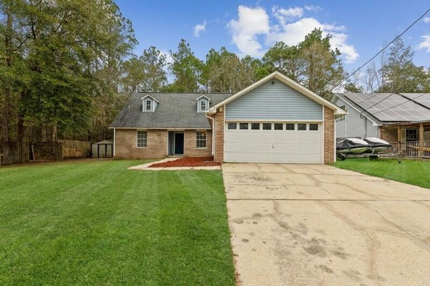 Prime location! This home is located off the 1st road entering into Crestview! South of I10 with easy access to 7th Group, Duke Field, Hurlburt, and Eglin AFB. This home has so much to offer! It has 4 bedrooms, 3 FULL bathrooms (2 master suites) PLUS a BONUS living space upstairs for that extra space you need for an office, playroom, or work-out area! Backed up to plenty of woods makes for great privacy. The roof is only 11 years old, 2-year-old HVAC, and a 5-year hot water heater which is GREAT for insurance. The fireplace has a new insert & cap, new flooring in the kitchen, downstairs master bedroom suite, new flooring in the upstairs master bathroom suite, brand new tile in the upstairs master suite bathtub, freshly painted throughout, new garbage disposal, and a brand-new back door! Renewed and transferable pest control bond. The kitchen is perfect for all your cooking needs, it has a gas stove with a built-in GRILL and a massive vent! You don't want to miss this one. Call and schedule your appointment today! Don't forget to ask about 100% financing options. 