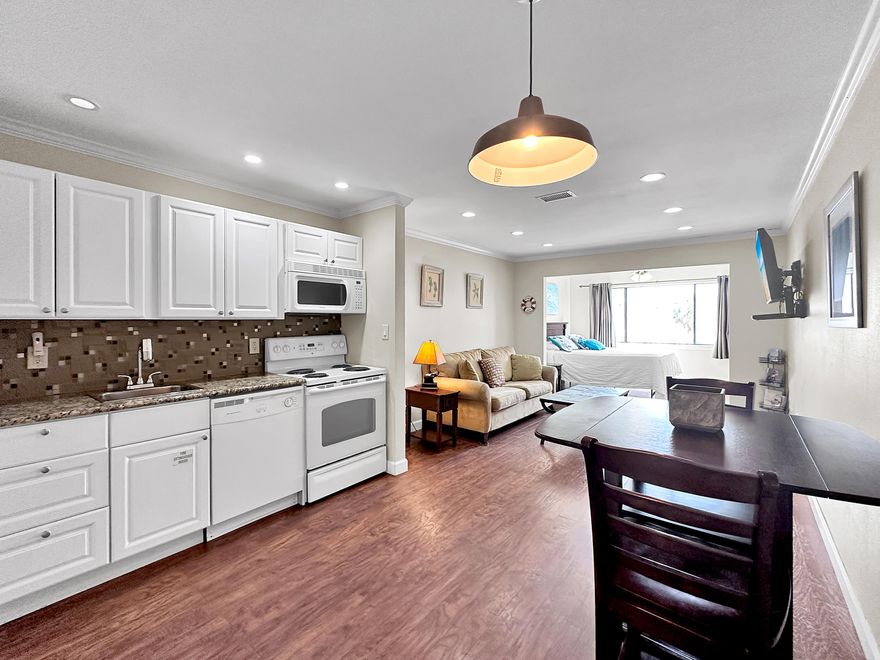 ** SELLER OFFERING A $2,500.00 CONCESSION AT CLOSING FOR UPGRADES ** so you can make this outstanding condo your own!Meet me where the sky touches the sea! This charming beachfront studio condo offers the ultimate seaside retreat for those seeking a cozy and intimate living space. With 492 square feet of well-designed comfort, this property boasts an idyllic setting where sun, sand, and surf harmoniously blend.Nestled within the popular and impeccably maintained seaside community of The Palms at Sunset Harbor, step inside to be greeted with a tastefully designed interior that maximizes every inch of space. The open-concept layout creates a seamless flow between the living, dining, and sleeping areas, making it ideal for both relaxation and entertainment. Outside you'll find your very own private paradise. The lush grounds of the complex offer a plethora of amenities to enjoy. For the fishing enthusiasts, the private fishing pier beckons, providing the perfect spot to cast a line and reel in the day's catch. Picture yourself hosting gatherings or grilling your fresh catch under the shade of the charming community gazebo.

When you're ready for a refreshing dip, look no further than the inviting pool area. Bask in the sun on a lounger or take a refreshing swim, the pool serves as your personal haven for relaxation and recreation.

Beyond the complex, this prime location offers easy access to a myriad of attractions. From world-renowned beaches and water sports to vibrant dining and shopping districts, the best of the area is just moments away. Whether you prefer adventurous outings or laid-back strolls, you'll find it all within reach.

This property will stand out to savvy investors as a fully-furnished, turnkey rental with active reservations on the books. Its low price point guarantees a great return, and the current owners have enjoyed many years of residual income while also visiting the unit anytime they please. It really couldn't be a more ideal situation as an investment property.

Whether you seek a vacation retreat, an investment opportunity, or a year-round slice of coastal bliss, this studio beach condo is your ticket to an enviable beachside lifestyle. Schedule your showing today and make your beachfront dreams a reality!
