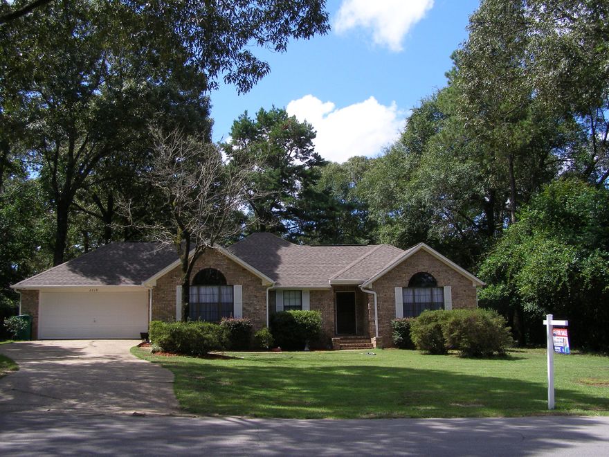 Wonderful home with great curb appeal waiting for it's new family. All brick 3 bedroom 2 bath with a two car garage. Enter into a foyer opening up to a spacious family room with cathedral ceilings. Kitchen has lots of cabinets, granite counter tops, with newer Frigidaire appliances including a convection oven. This split floor plan home has a master bedroom equipped with vaulted ceilings, master bath has his and hers walk in closets, dual vanity, jetted garden tub and a separate shower. The two other bedrooms are spacious with ample closet space. Many upgrades include an almost brand new water heater, almost new very efficient 14 seer HVAC and the dimensional single roof was installed just a few years ago. Nice sized back yard with a patio to enjoy. Make your appointment today!