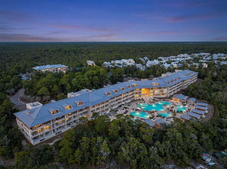 Welcome to Unit 1101 at Sanctuary at Redfish -- a rare first-floor end residence offering sunrise and sunset views, framed by peaceful wooded surroundings. Extra windows unique to this end-unit design fill the home with natural light, creating a bright, airy coastal feel.Enjoy easy beach days with seasonal pontoon service across Redfish Lake from the community dock, kayak and paddleboard access on the lake, gated walk-in access along Scenic 30A, and three resort-style pools just steps away.Inside, the residence is move-in ready with fresh interior paint, a new HVAC system, and updated tile flooring in the main living areas -- ideal for relaxed mornings and resort-style living. Thoughtfully priced, this home offers an exceptional opportunity to own in this coastal gated community. Perfectly positioned along Scenic Highway 30A in Blue Mountain Beach, part of Santa Rosa Beach, Sanctuary at Redfish is a gated luxury community of just 64 residences situated on approximately 14 acres along Big Redfish Lake. Amenities include three resort-style pools plus two spas, an expansive pool deck with cabanas, outdoor grills, a large fire pit, fitness center, business center, walking trails, underground parking, private storage lockers, and dock access for kayaking and canoeing.

A seasonal pontoon water taxi offers scenic rides across Redfish Lake to approximately 670 feet of Gulf-front beach exclusive to Sanctuary at Redfish, Sanctuary by the Sea, and The Preserve homeowners. This private stretch sits adjacent to public beach access, creating an expansive shoreline that allows owners and guests to spread out and enjoy a relaxed beach day. Grayton Beach State Park beach access is also within walking distance, offering additional coastal beauty nearby.

The community reflects pride of ownership, supported by long-standing on-site HOA management and the original landscape team still caring for the property today, creating a beautifully maintained coastal setting owners truly appreciate. 

Freshly updated and filled with natural light, Unit 1101 features large porches that extend the living space outdoors, with both primary suites offering direct access in a split-bedroom layout ideal for guests or rentals. This three-bedroom residence includes two full baths plus a convenient powder room, delivering comfort, privacy, and effortless first-floor living in one of 30A's most serene luxury communities.